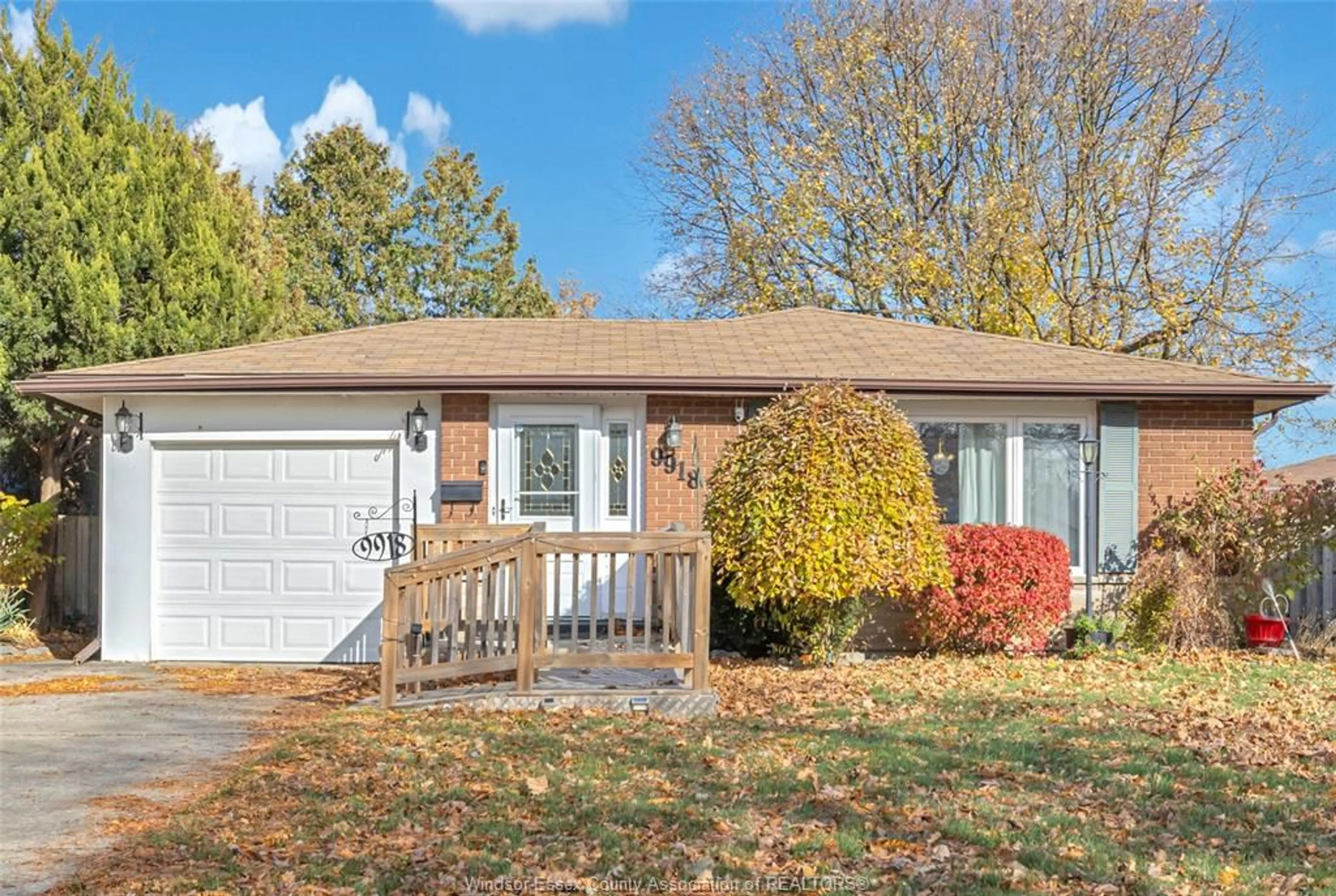 Home with vinyl exterior material, street for 9918 Asgard Rd, Windsor Ontario N8R 1E2