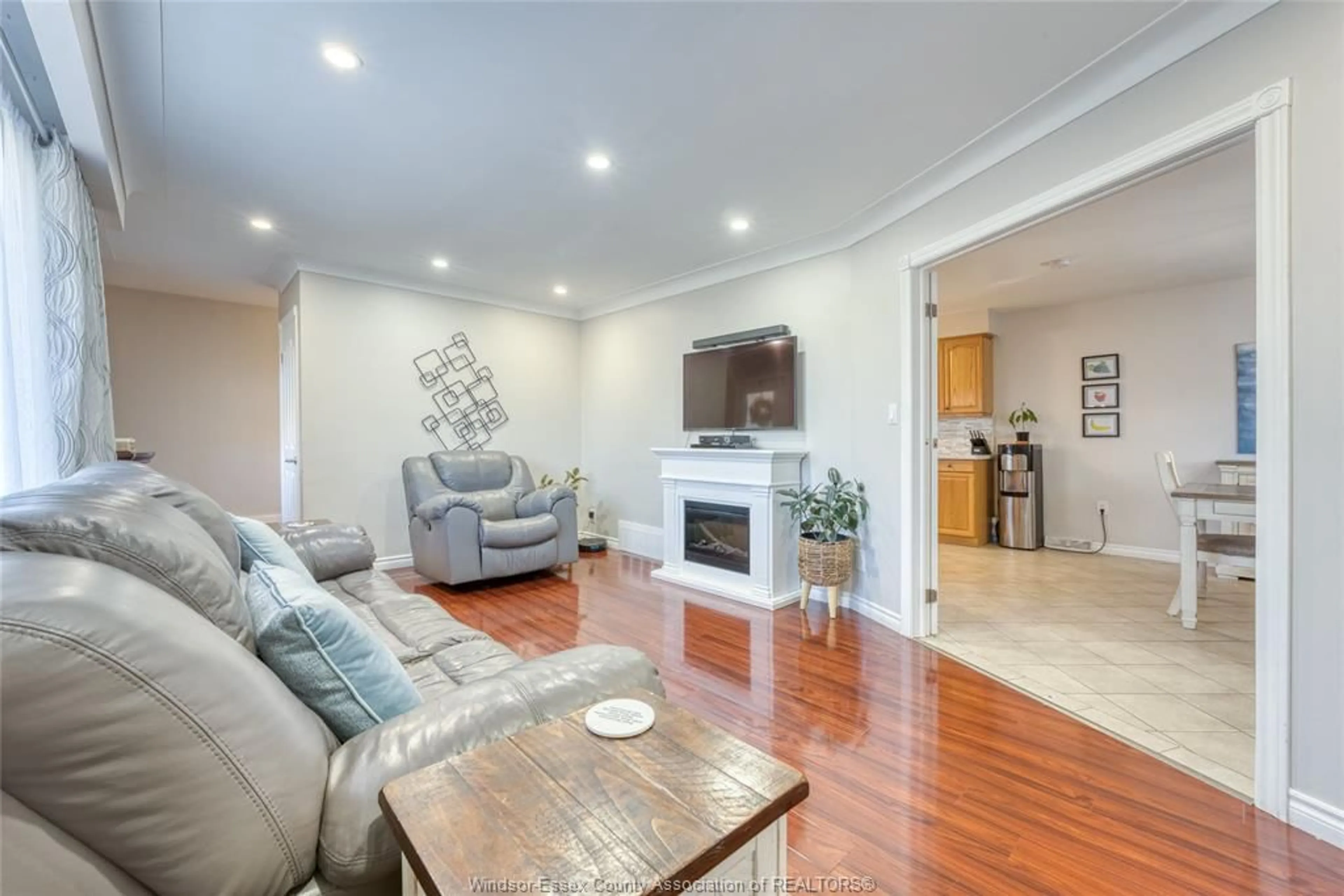 Living room with furniture, wood/laminate floor for 111 Danforth, Leamington Ontario N8H 2R1