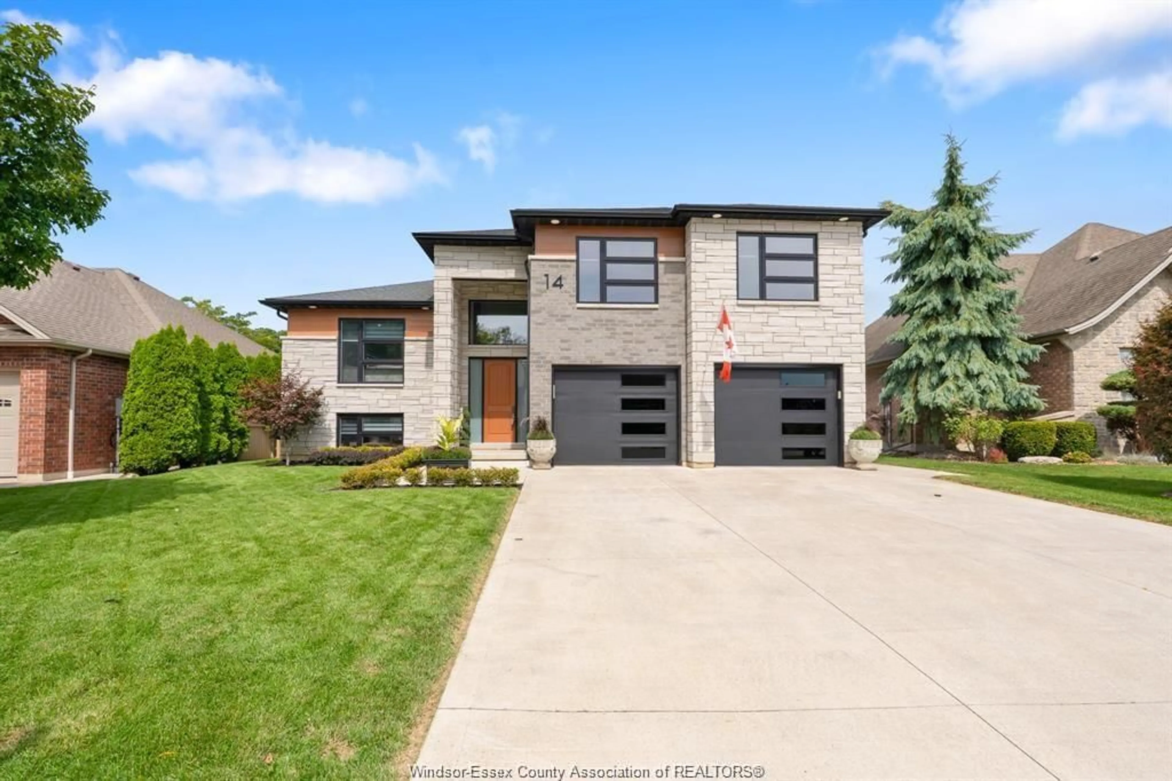 Home with brick exterior material, street for 14 PRIMROSE Dr, Kingsville Ontario N9Y 0A3