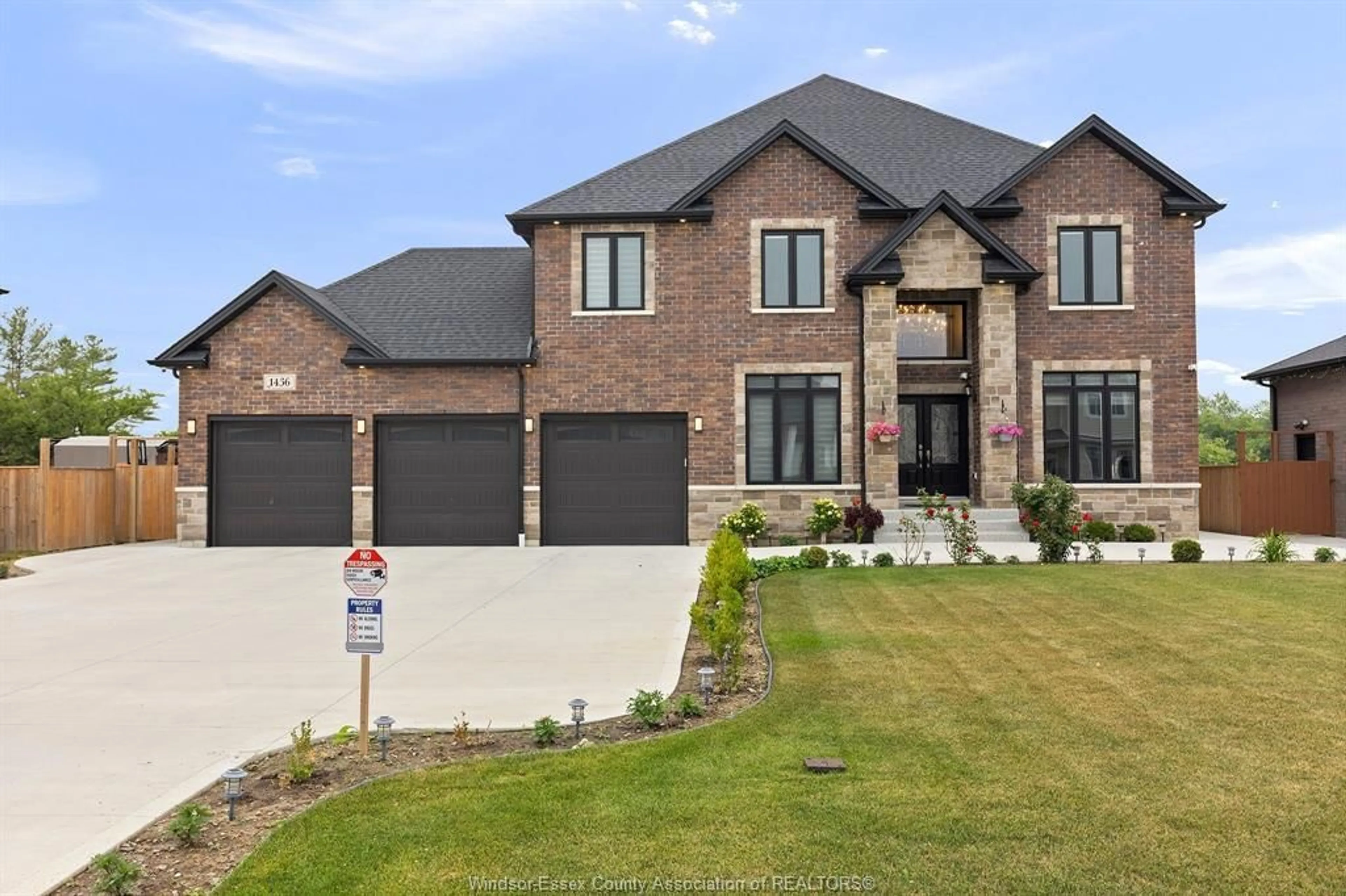 Home with brick exterior material, street for 1436 MULLINS Dr, Lakeshore Ontario N0R 1V0