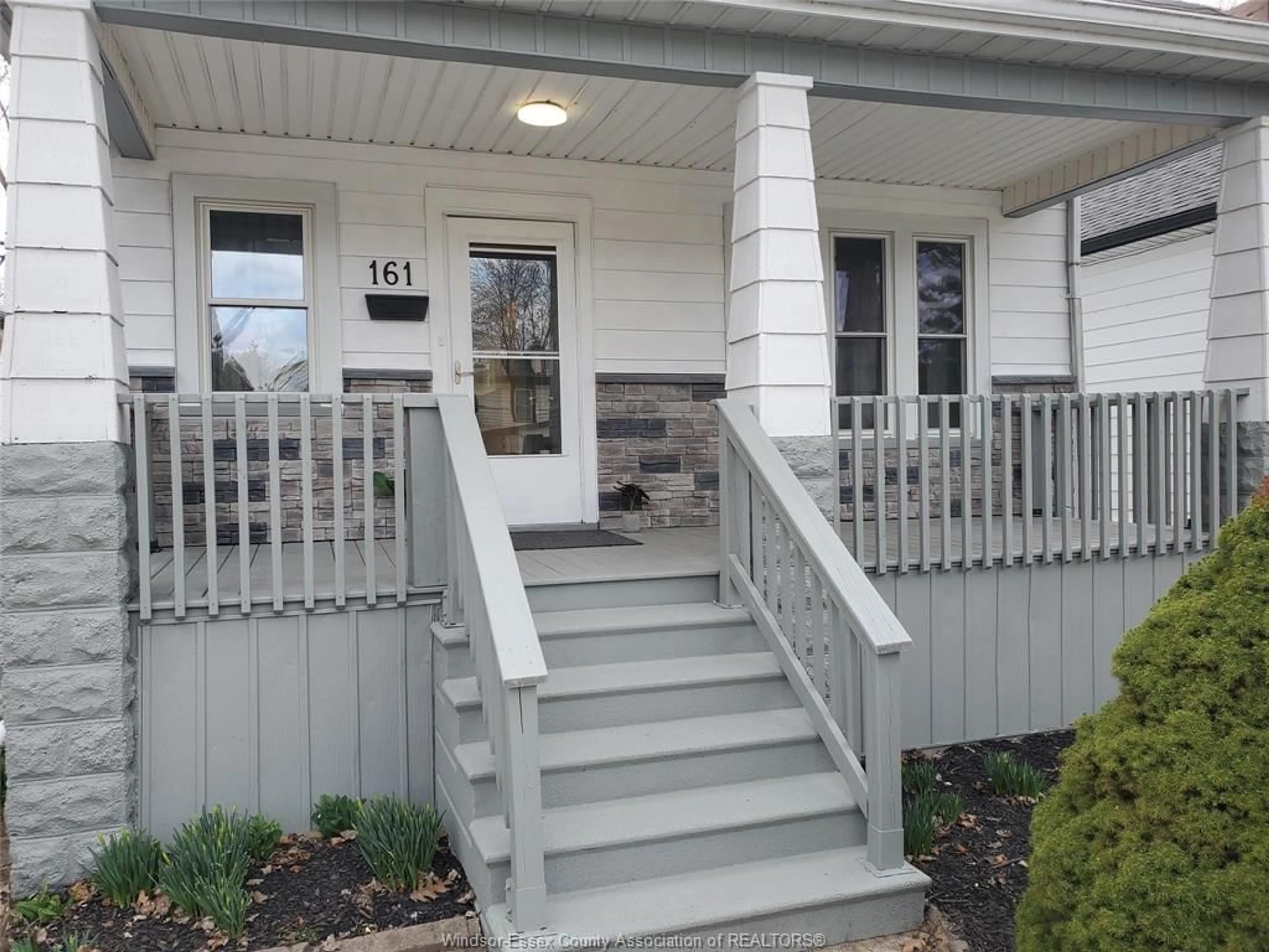 Home with vinyl exterior material, street for 161 CAMERON Ave, Windsor Ontario N9B 1Y5