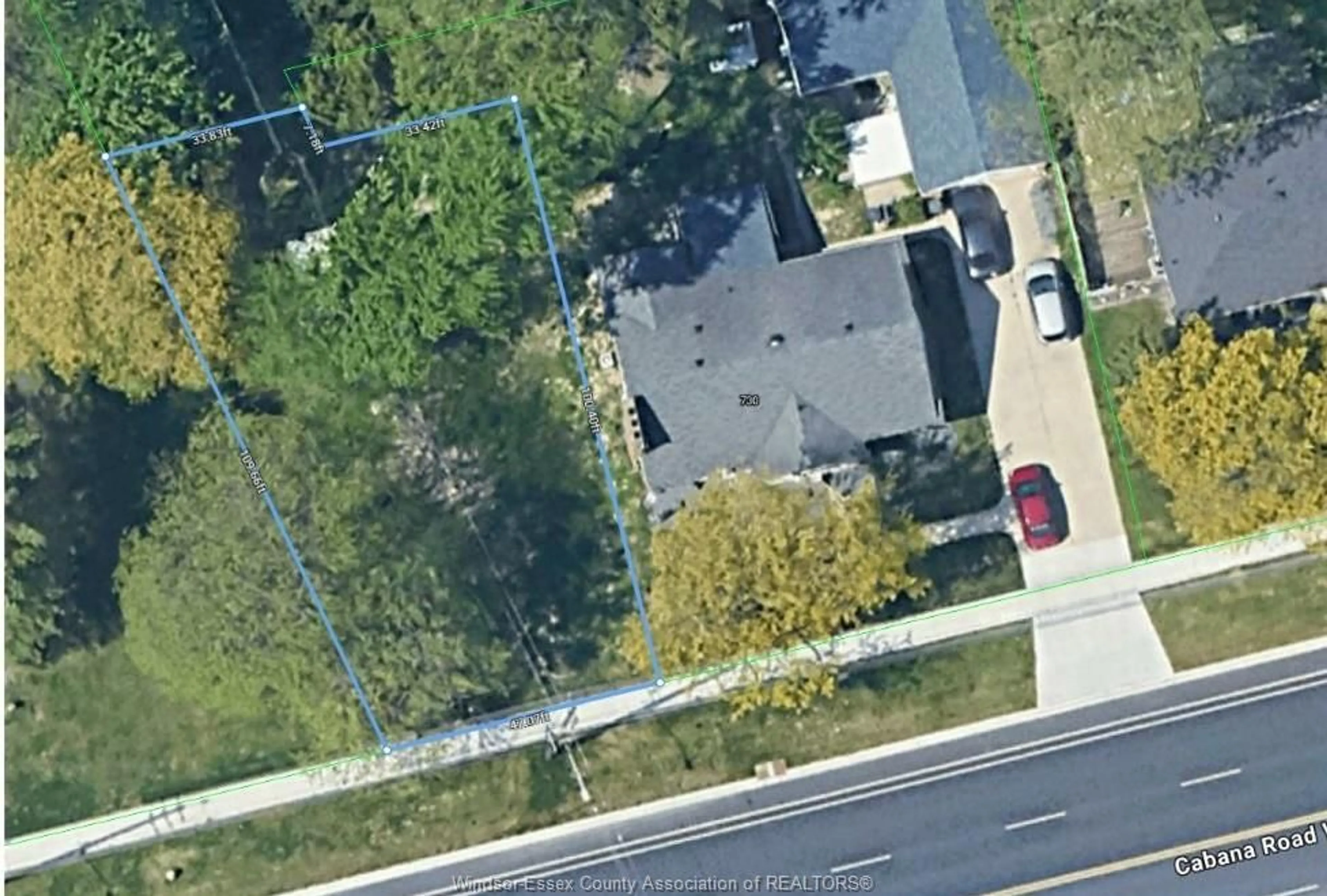 A pic from outside/outdoor area/front of a property/back of a property/a pic from drone, street for 740 CABANA RD W, Windsor Ontario N9G 1B4