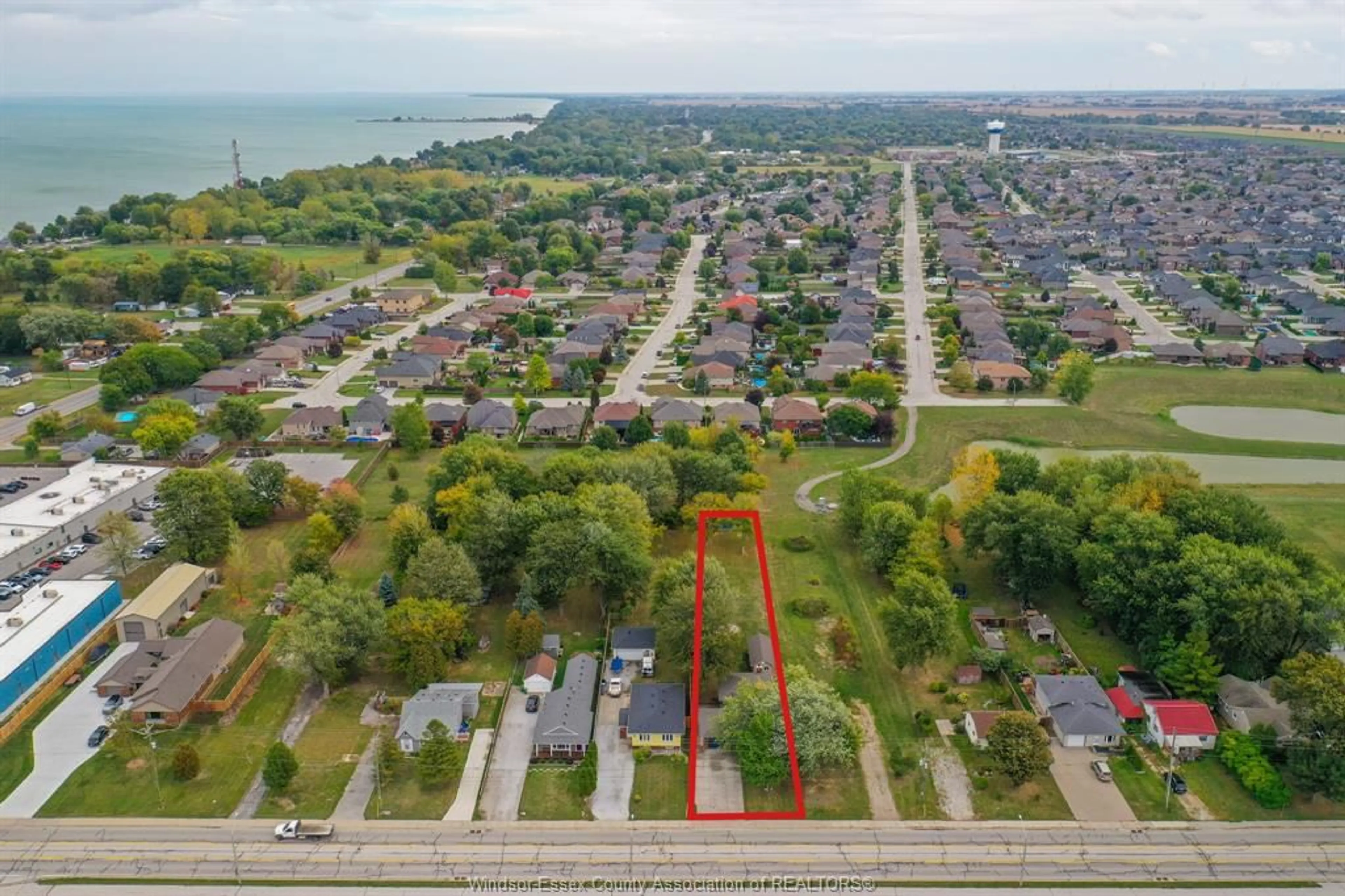 A pic from outside/outdoor area/front of a property/back of a property/a pic from drone, street for 234 RENAUD Line, Lakeshore Ontario N8L 0J7