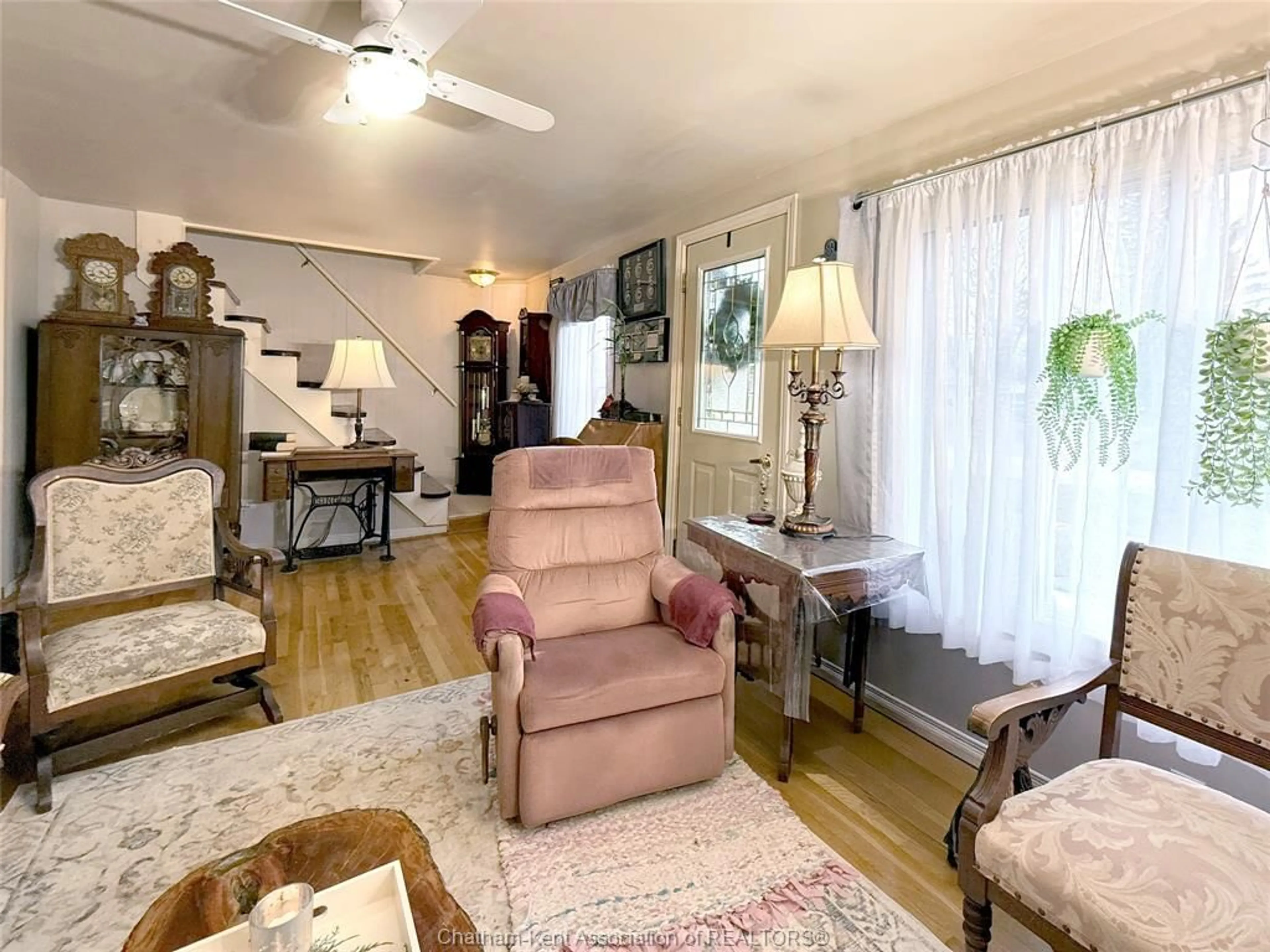 Living room with furniture, wood/laminate floor for 21 Albert Ave, Ridgetown Ontario N0P 2C0