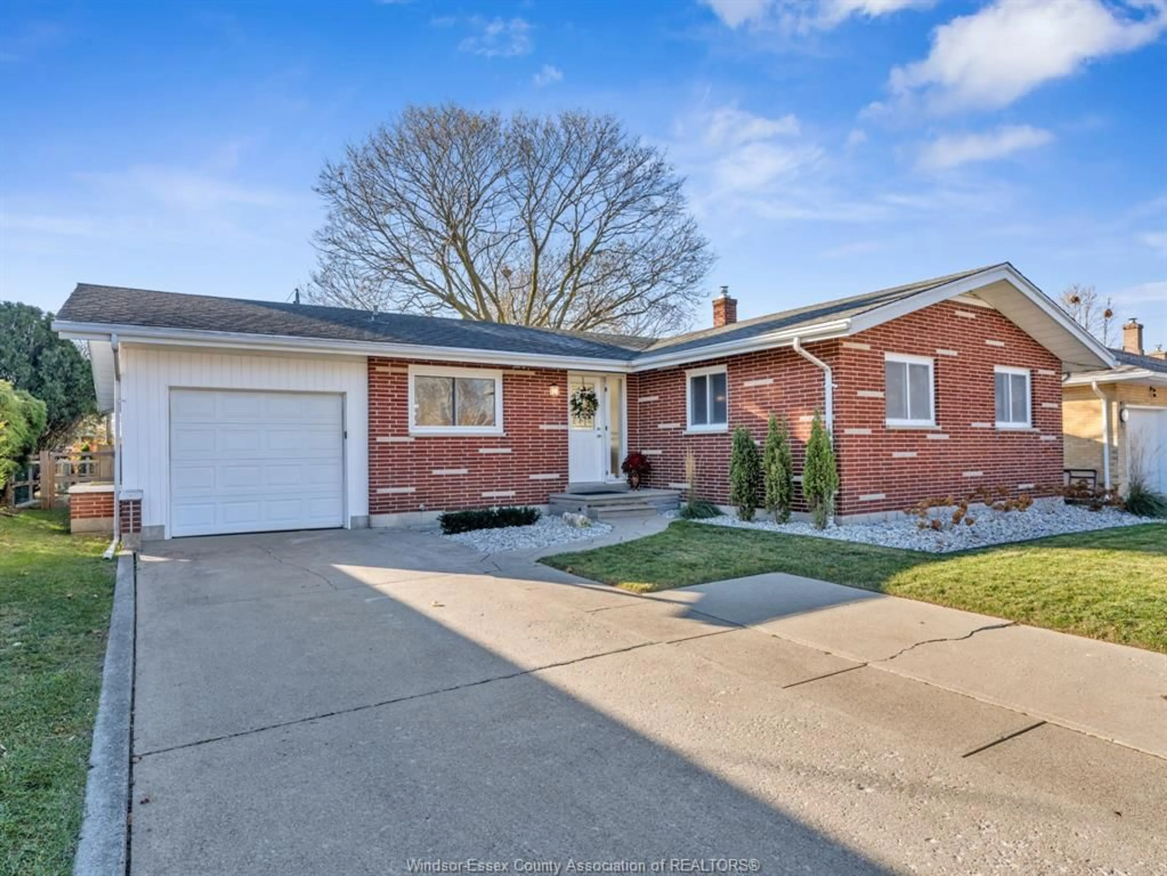 Home with brick exterior material, street for 8 Gladstone Ave, Leamington Ontario N8H 2H5