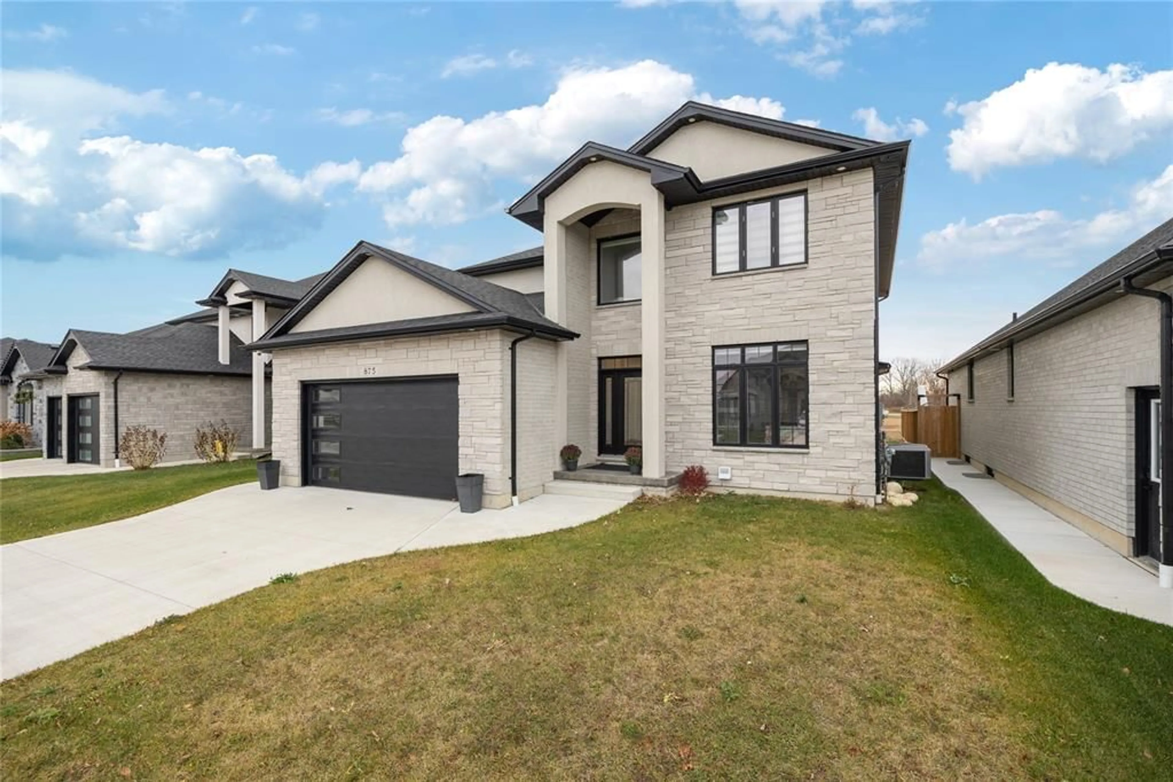 Home with brick exterior material, street for 875 MAGNOLIA Lane, Sarnia Ontario N7S 0G3