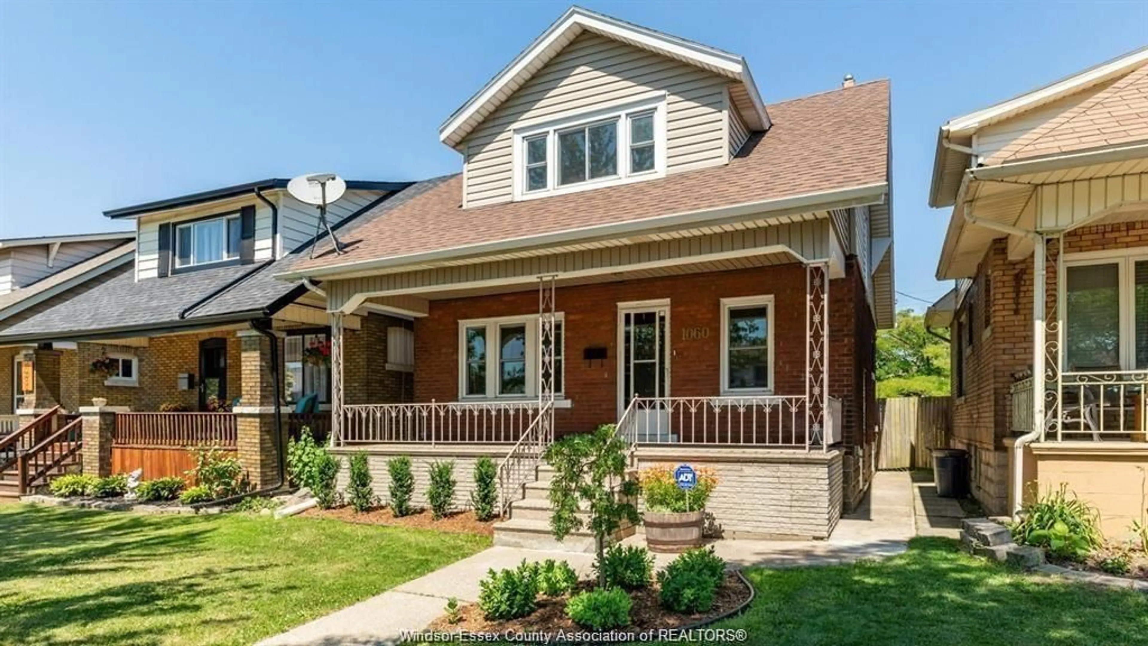 Home with brick exterior material, street for 1060 LAWRENCE Rd, Windsor Ontario N8Y 3Z8