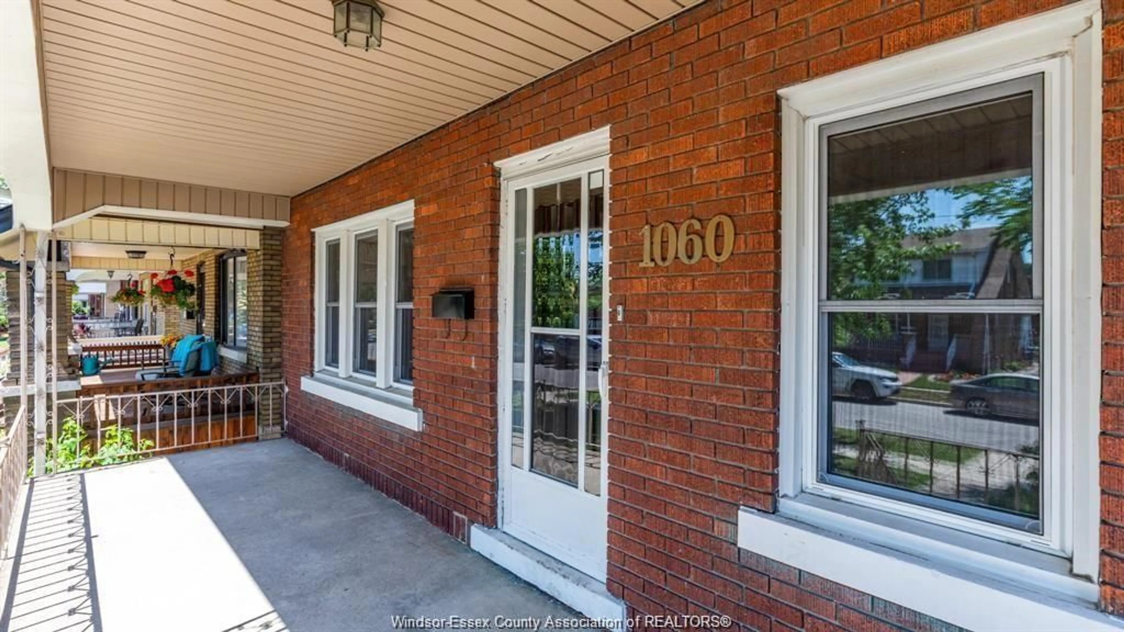 Home with brick exterior material, street for 1060 LAWRENCE Rd, Windsor Ontario N8Y 3Z8