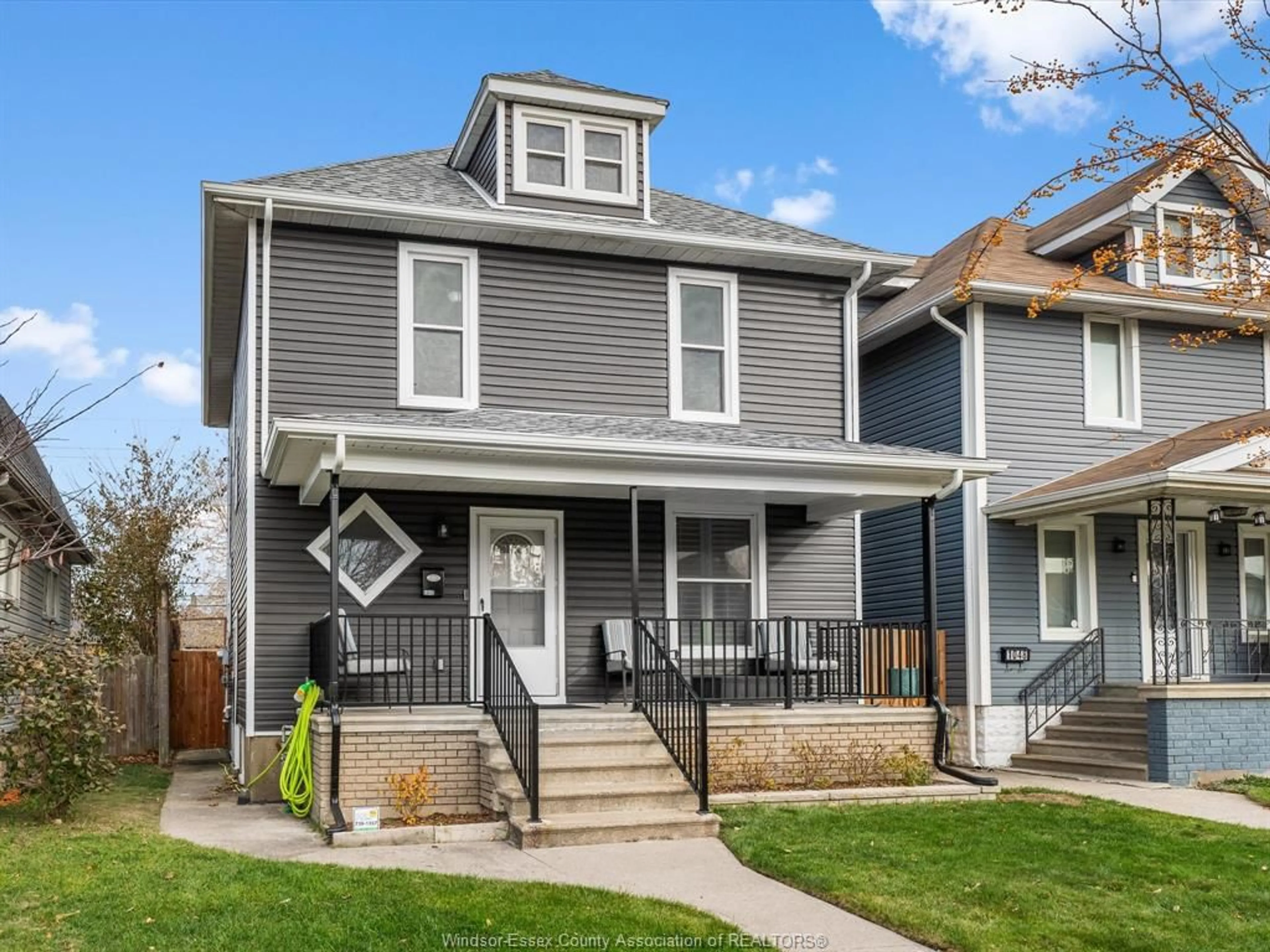 Home with vinyl exterior material, street for 1042 MOY Ave, Windsor Ontario N9A 2P3