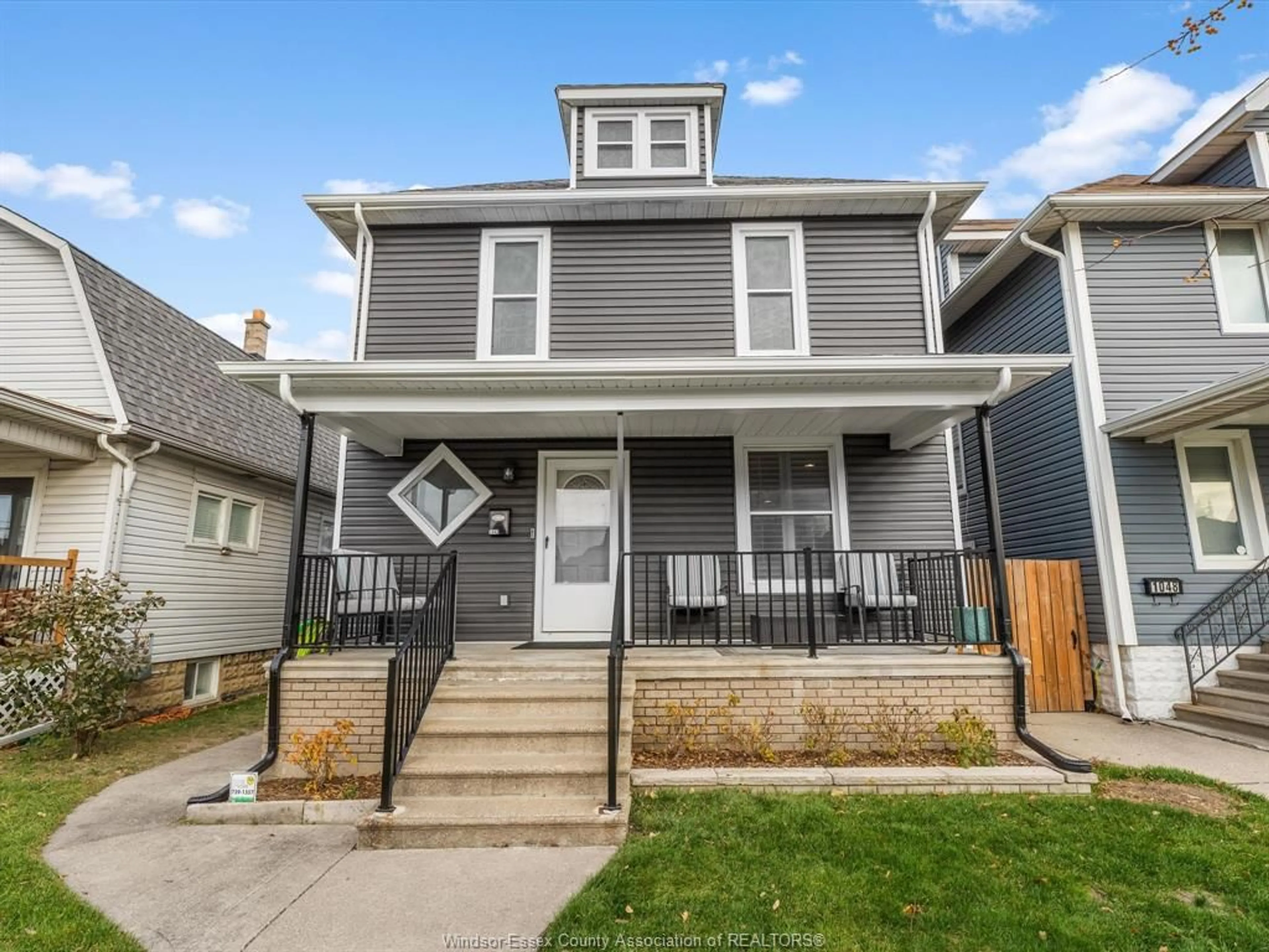 Home with vinyl exterior material, street for 1042 MOY Ave, Windsor Ontario N9A 2P3