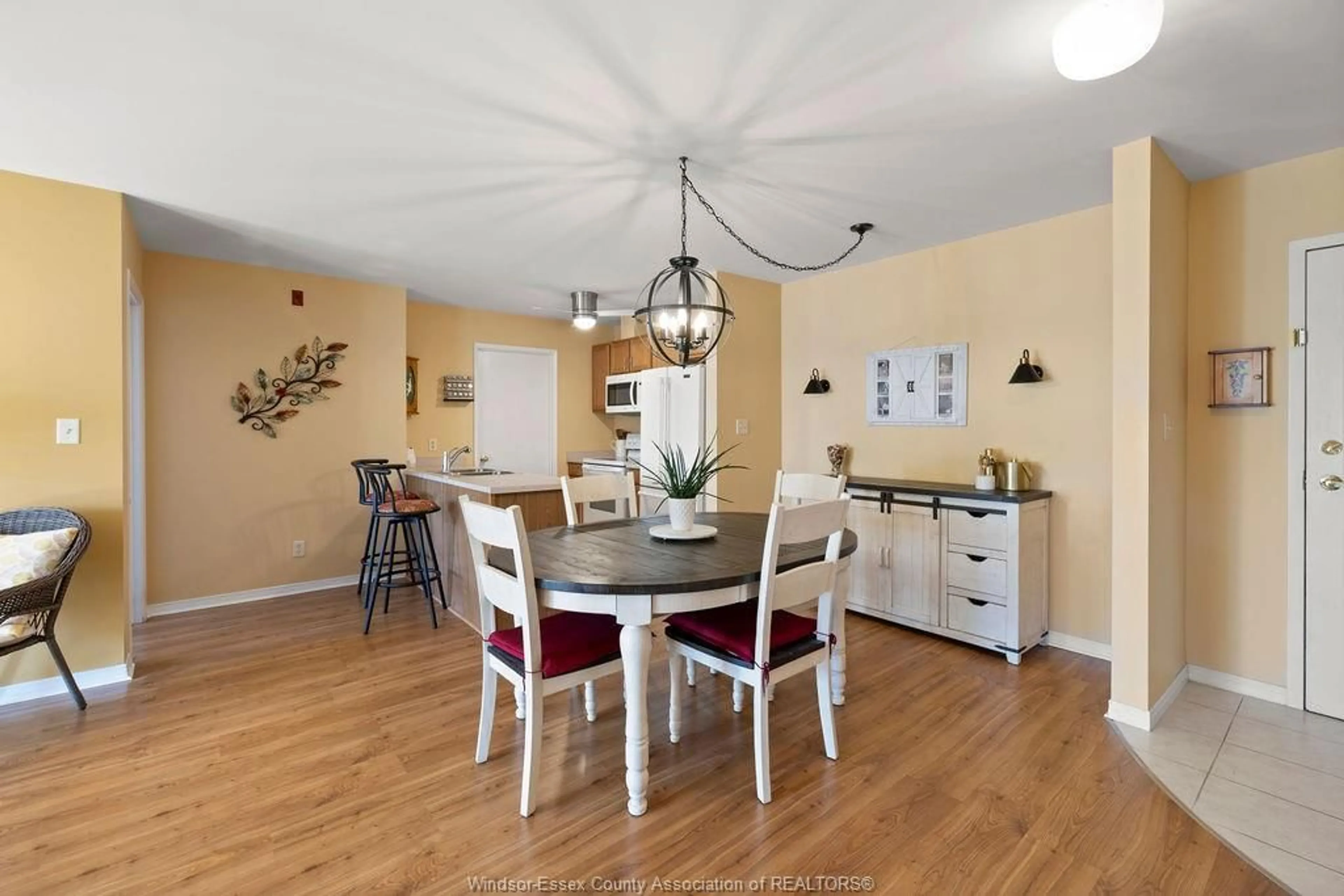 Dining room, wood/laminate floor for 5000 WYANDOTTE St #311, Windsor Ontario N8Y 5B8
