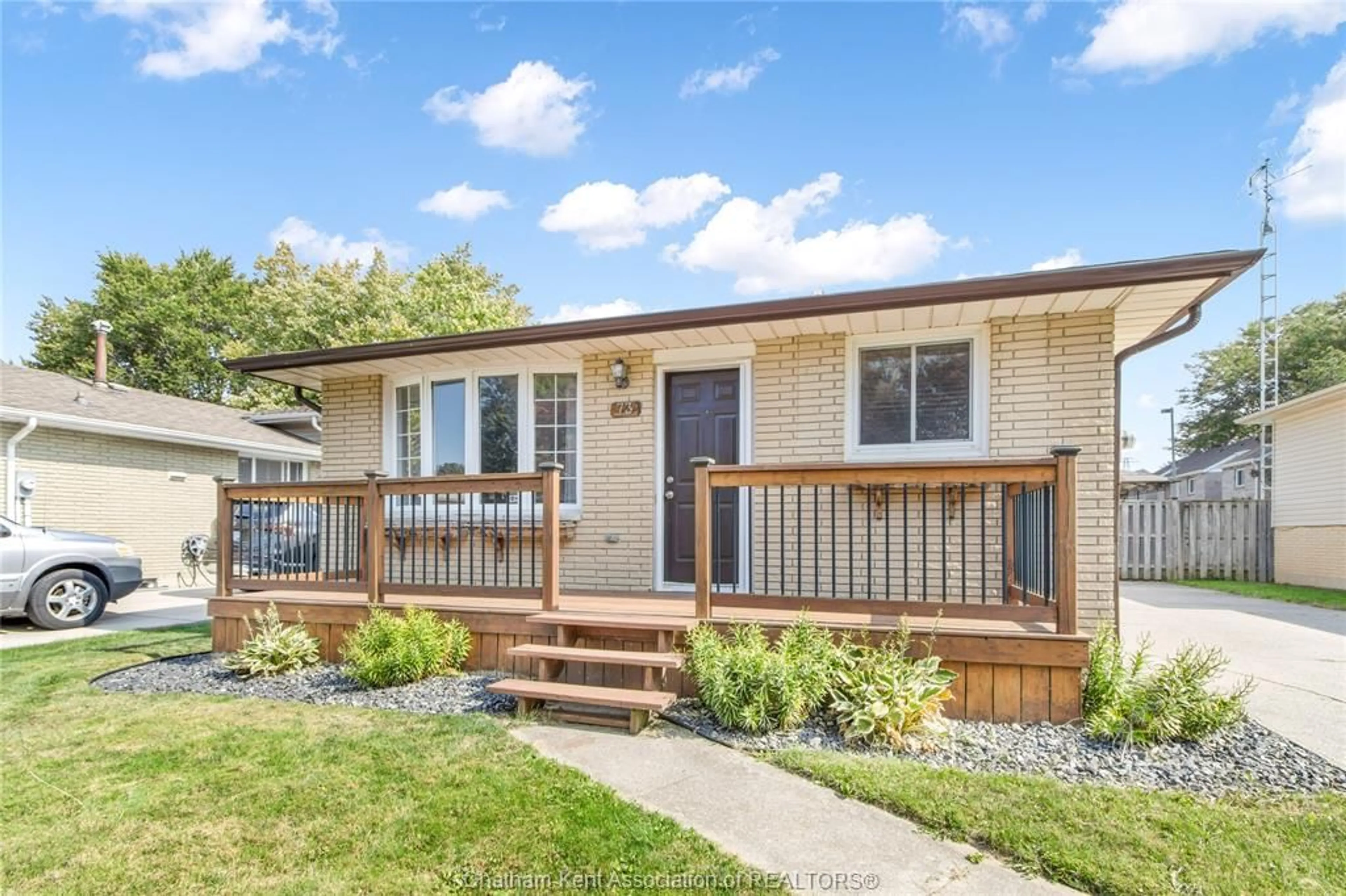 Home with vinyl exterior material, street for 73 MARION Ave, Chatham Ontario N7M 5N7