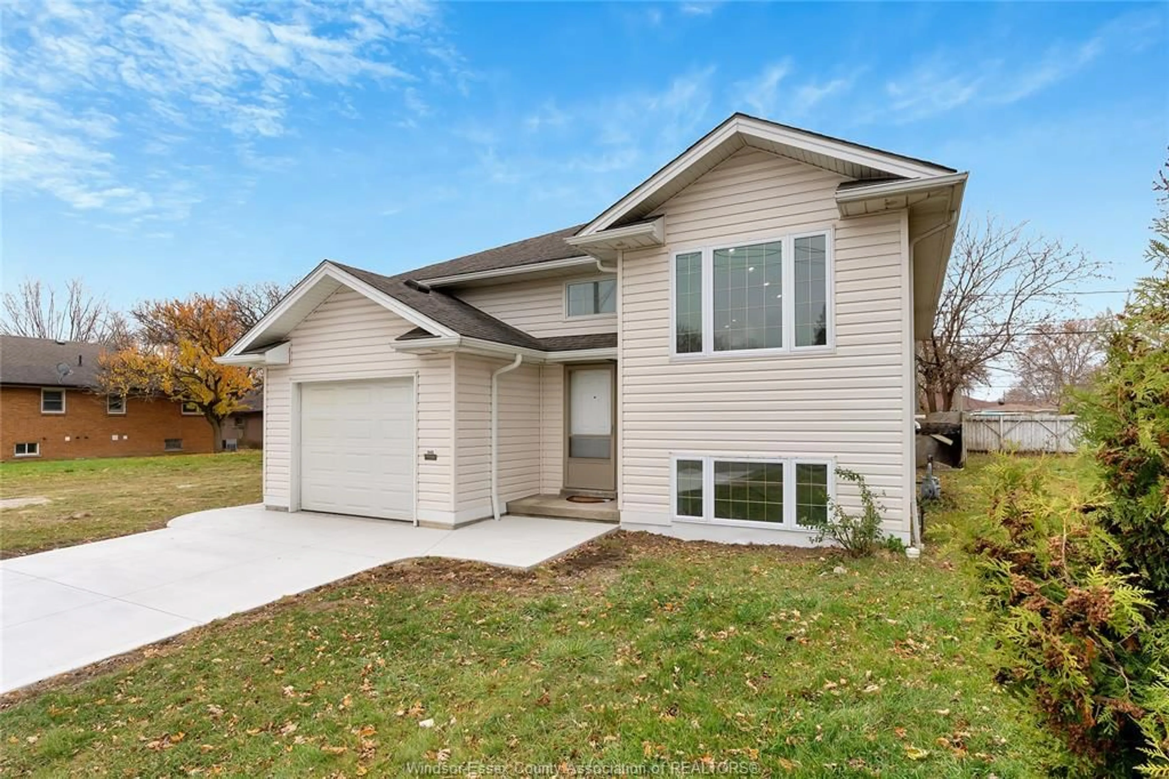 Home with vinyl exterior material, street for 1443 CAMPBELL Ave, Windsor Ontario N9B 2K1