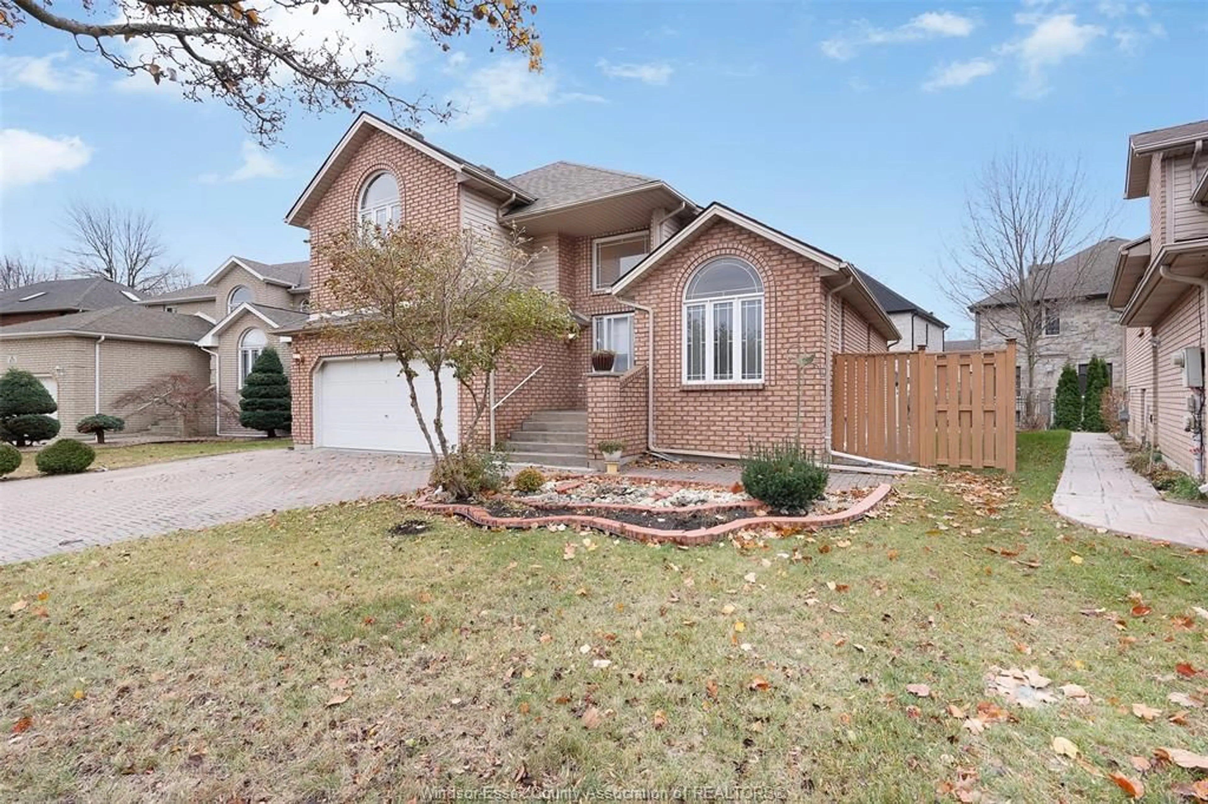 Home with brick exterior material, street for 469 John Harvey Crescent, Windsor Ontario N9E 4R3