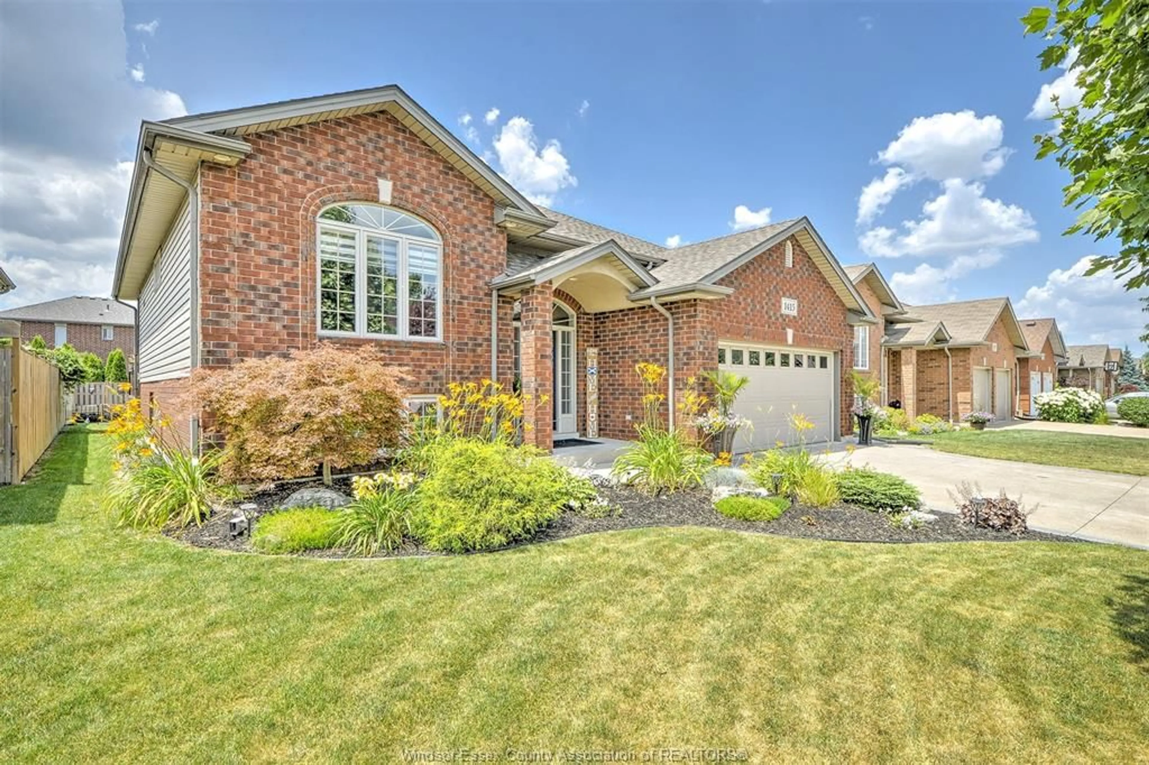 Home with brick exterior material, street for 1415 MAGNOLIA Ave, Windsor Ontario N8P 1Z3