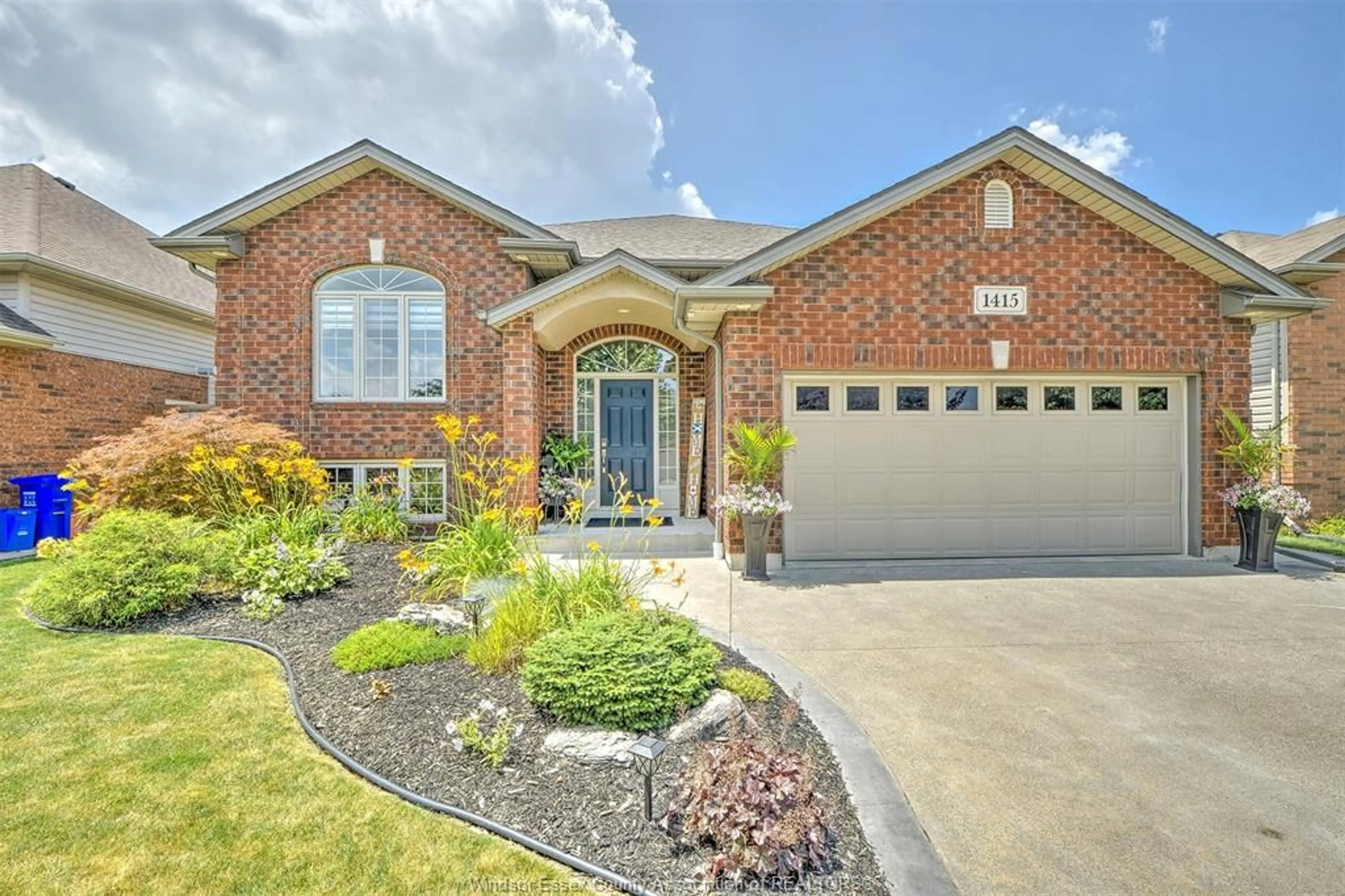 Home with brick exterior material, street for 1415 MAGNOLIA Ave, Windsor Ontario N8P 1Z3