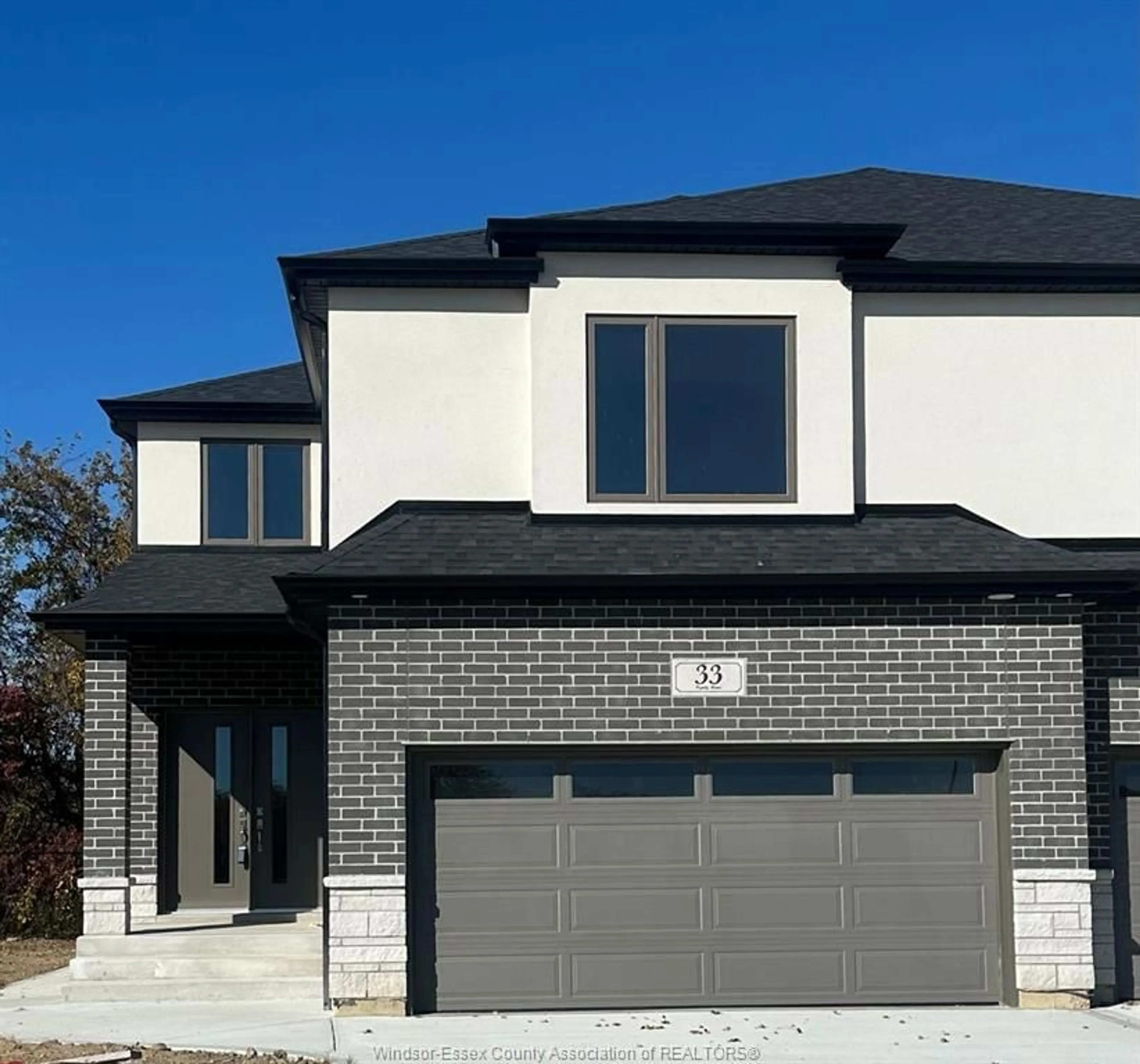 Home with brick exterior material, street for 33 EAGLE, Leamington Ontario N8H 3V4