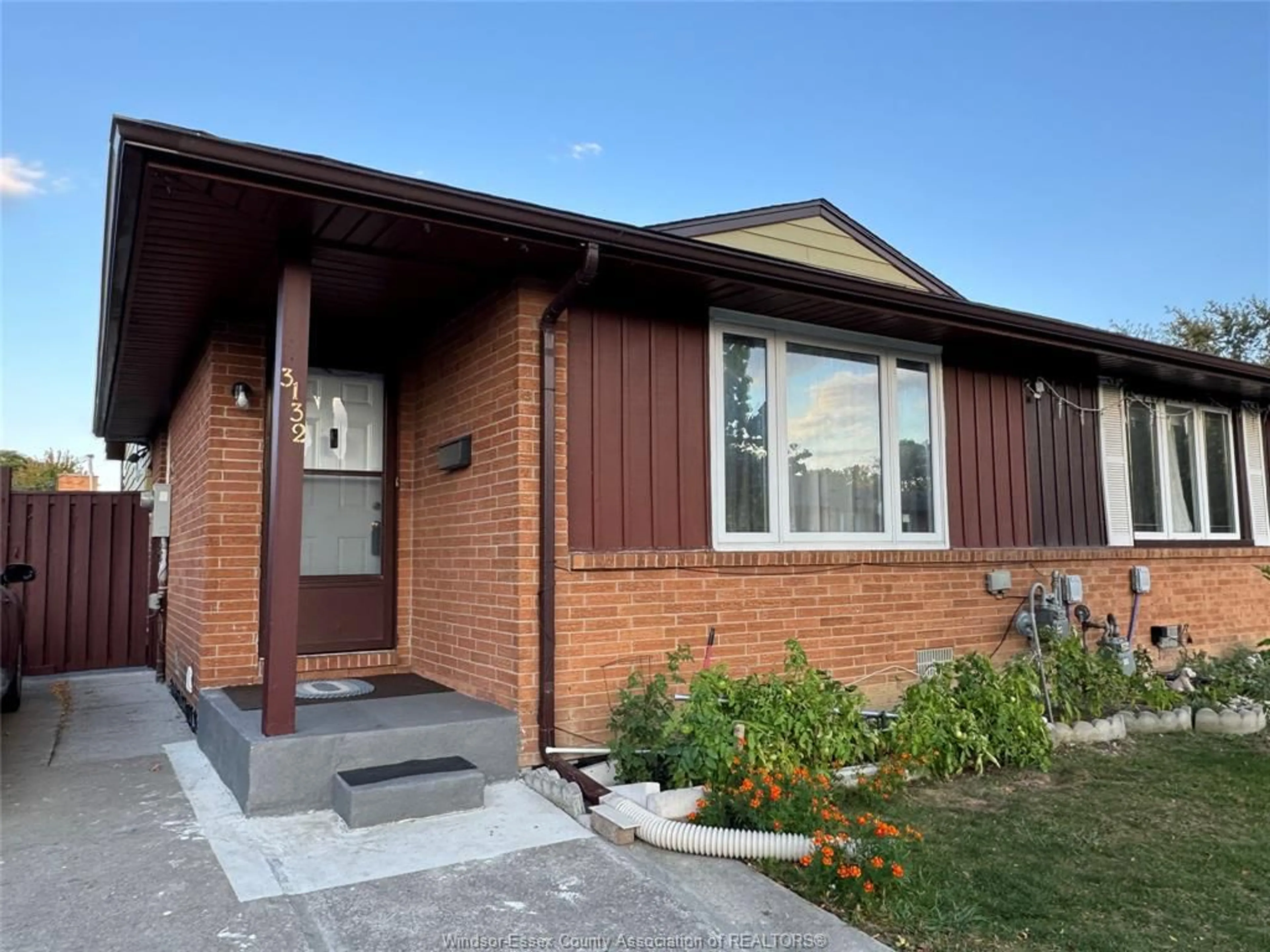 Home with brick exterior material, street for 3132 ELMWOOD Cres, Windsor Ontario N8R 1X4