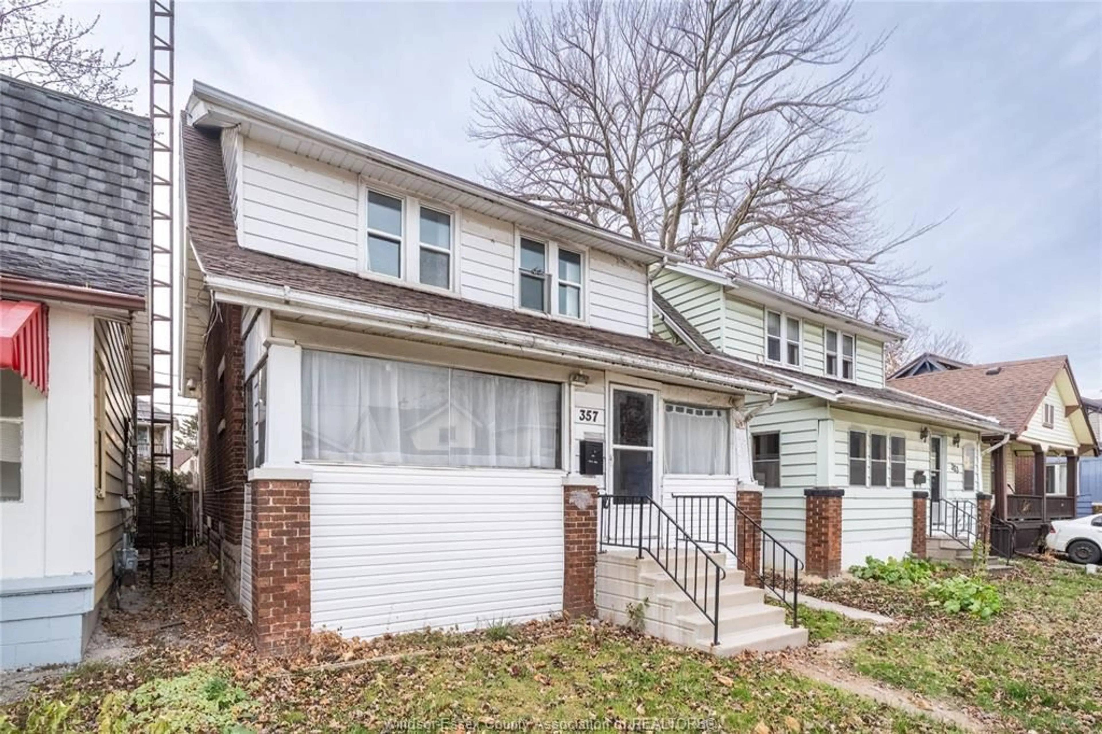Home with vinyl exterior material, street for 357 Josephine Avenue, Windsor Ontario N9B 2K9
