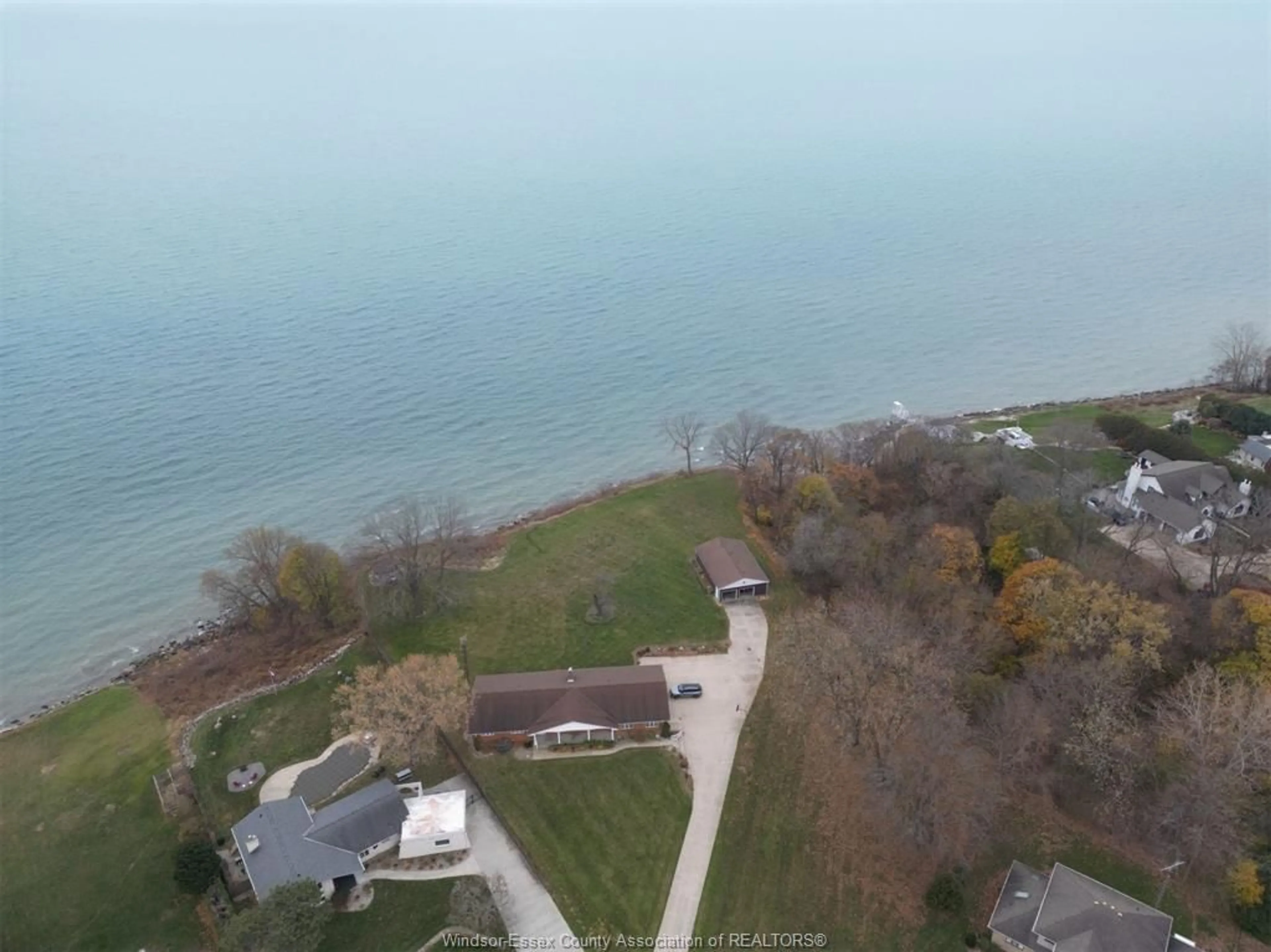 A pic from outside/outdoor area/front of a property/back of a property/a pic from drone, water/lake/river/ocean view for 1239 OXFORD & LOT 13 OXFORD Ave, Kingsville Ontario N9Y 2S8
