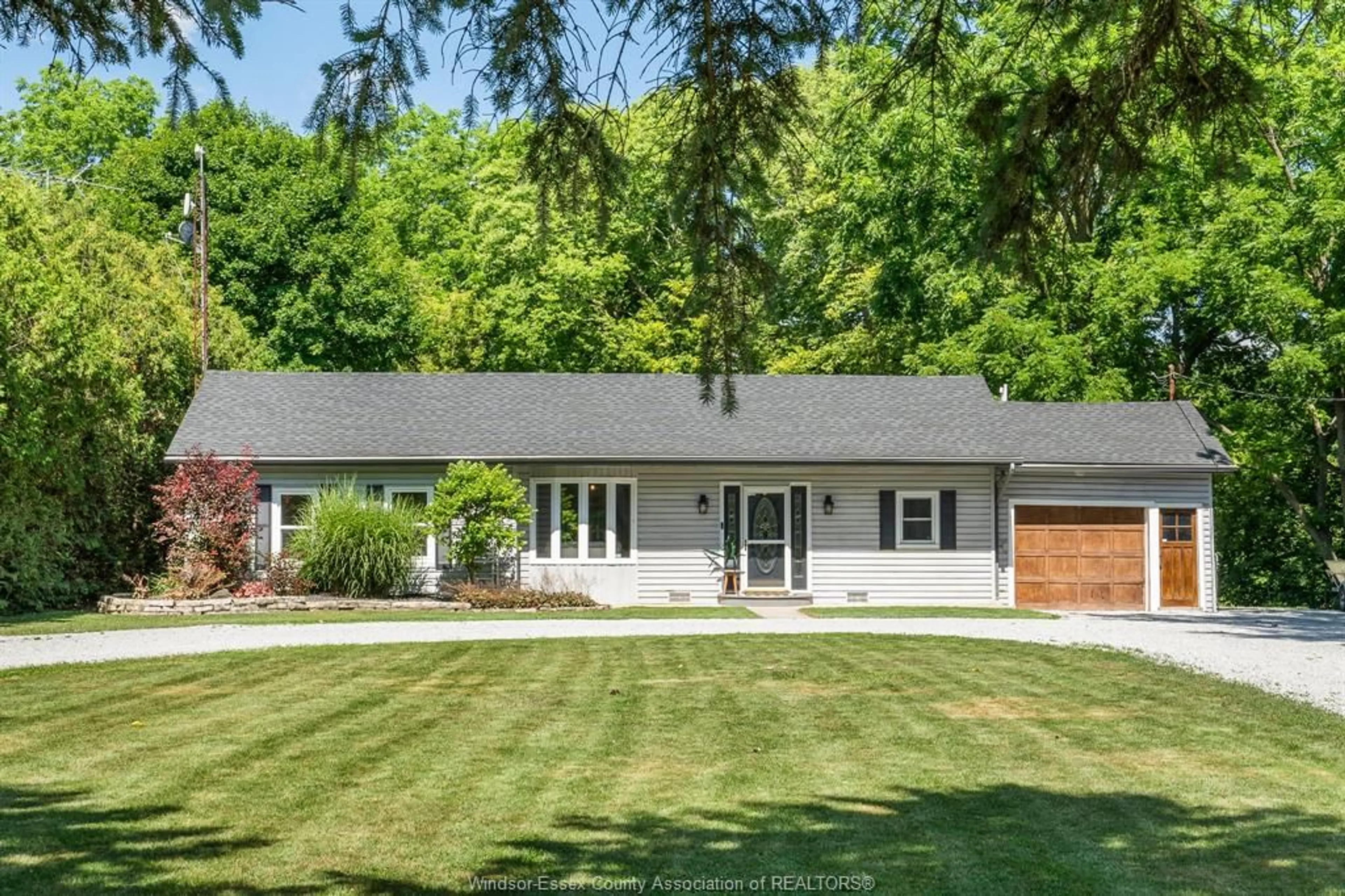 Home with vinyl exterior material, street for 9395 River Line, Chatham Ontario N7M 5J4