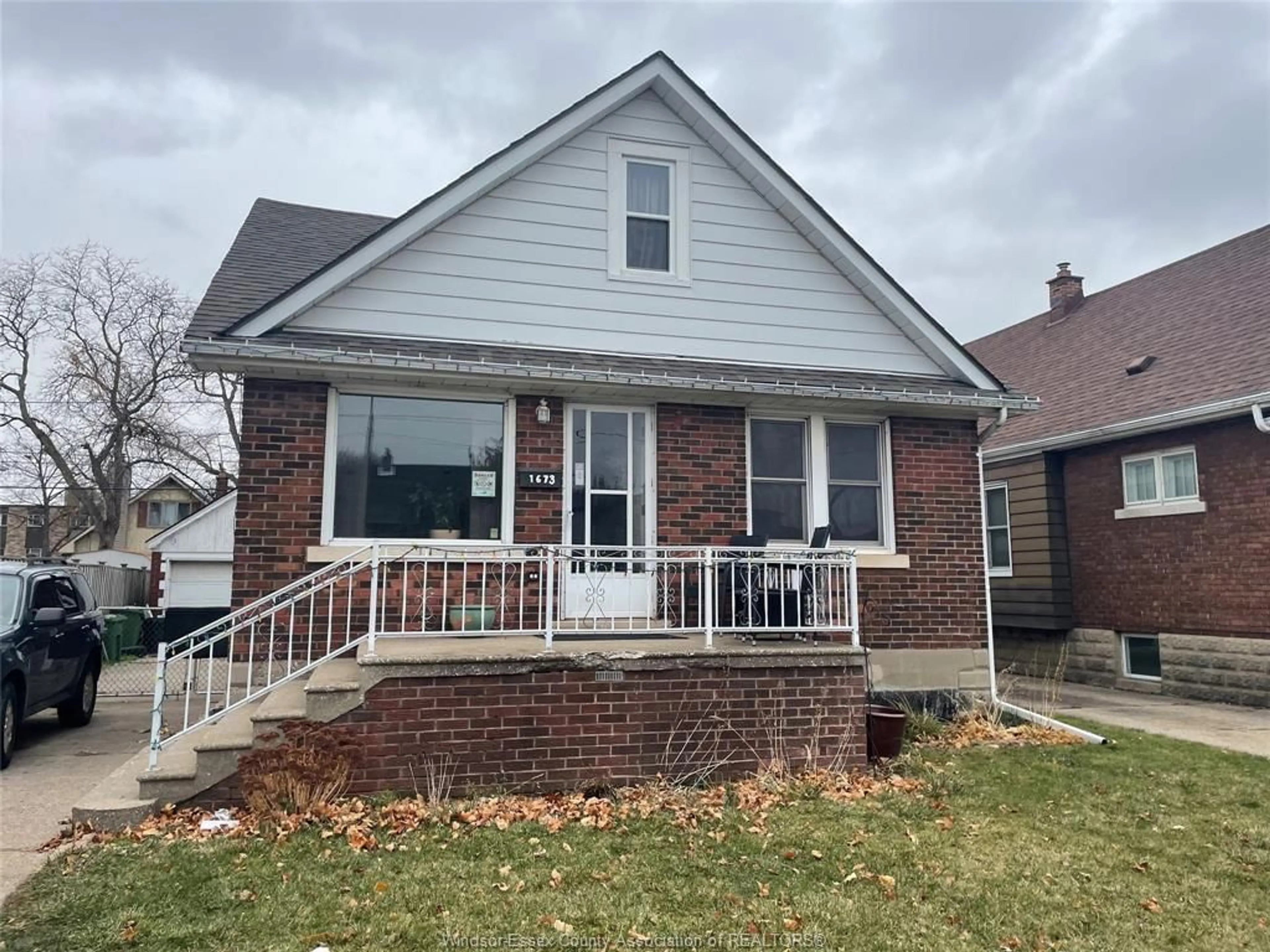 Home with brick exterior material, street for 1673 Pillette Rd, Windsor Ontario N8Y 3C4