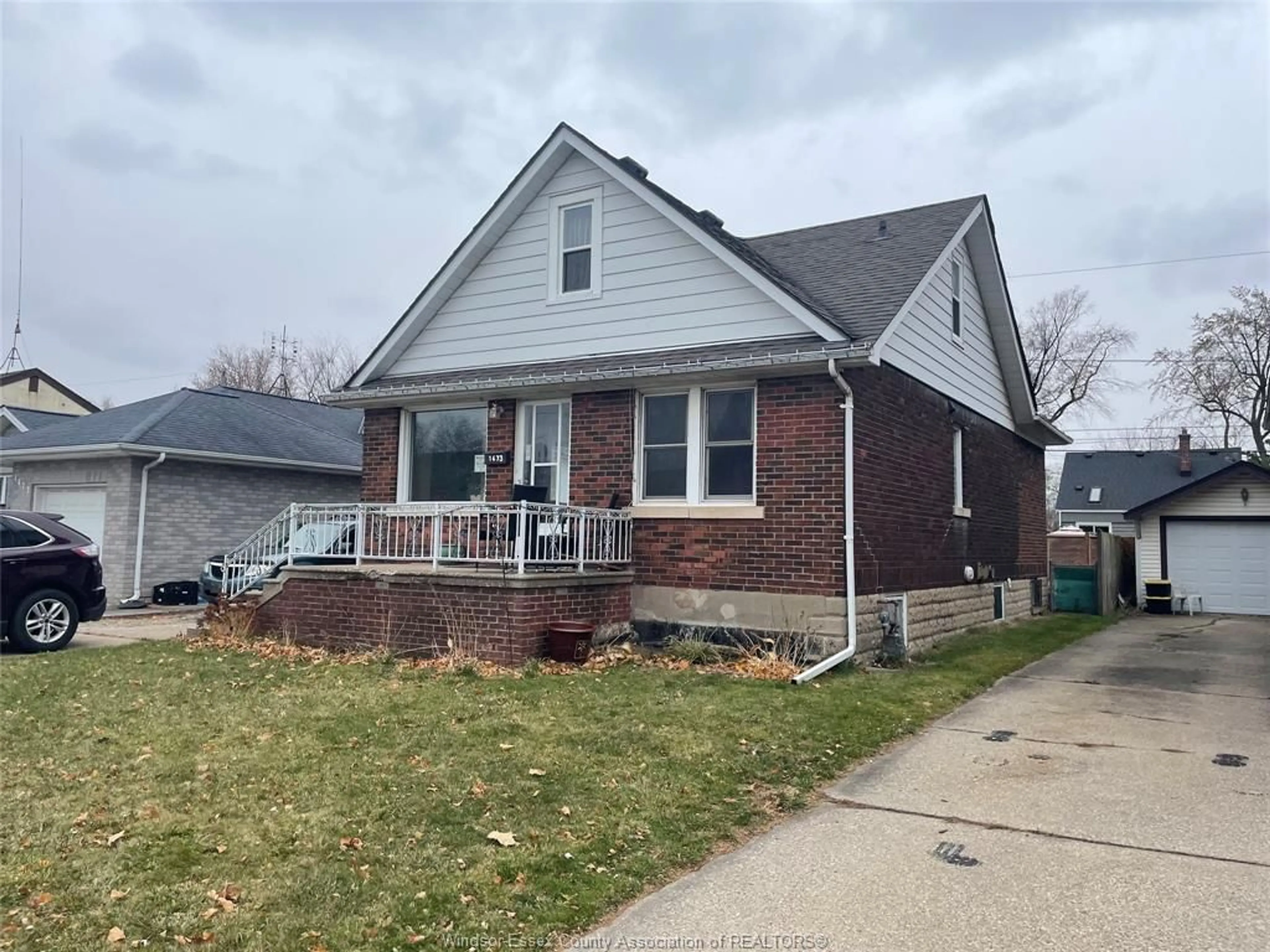 Home with brick exterior material, street for 1673 Pillette Rd, Windsor Ontario N8Y 3C4