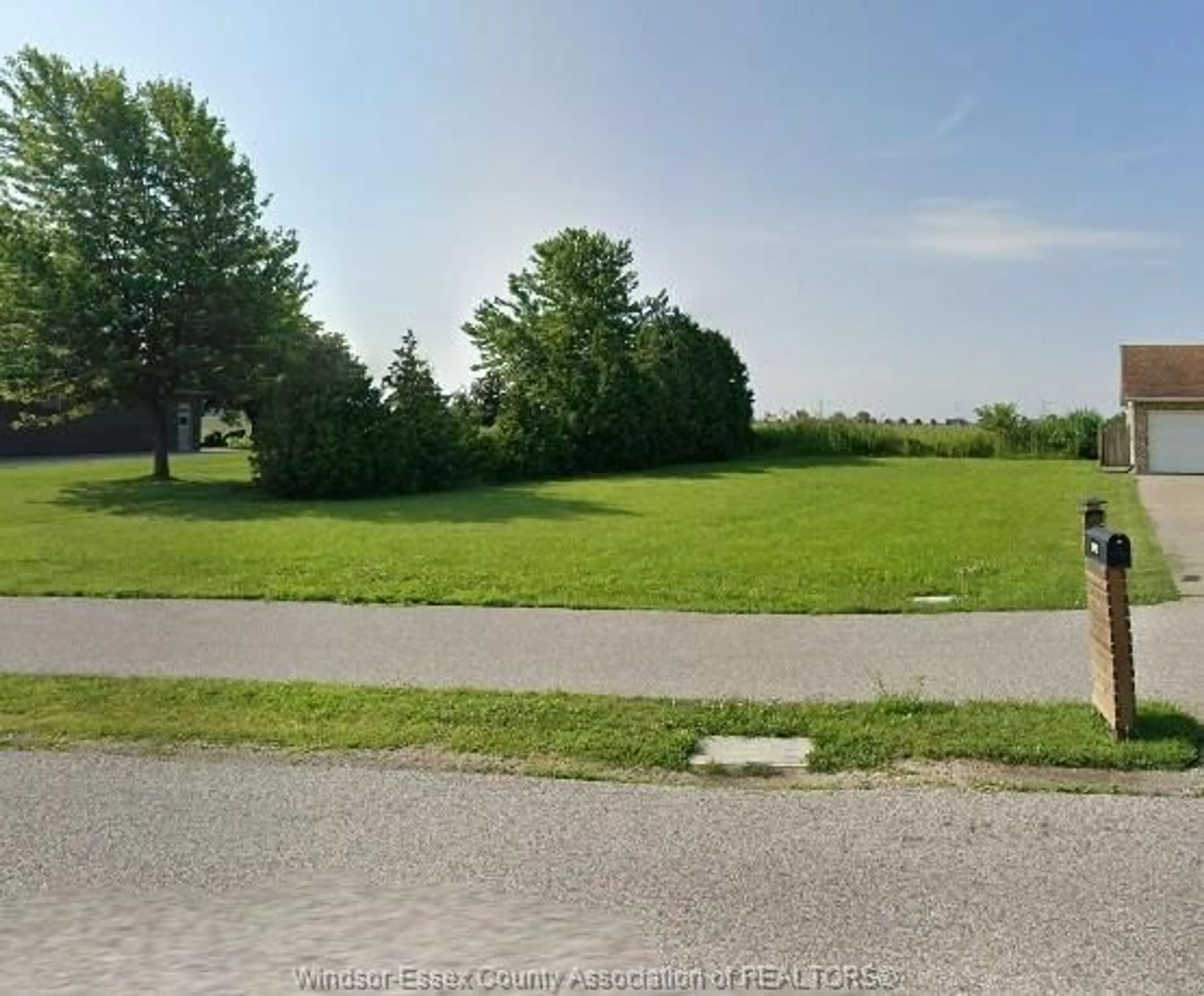 A pic from outside/outdoor area/front of a property/back of a property/a pic from drone, street for 3923 ST CLAIR Rd, Lakeshore Ontario N0R 1N0