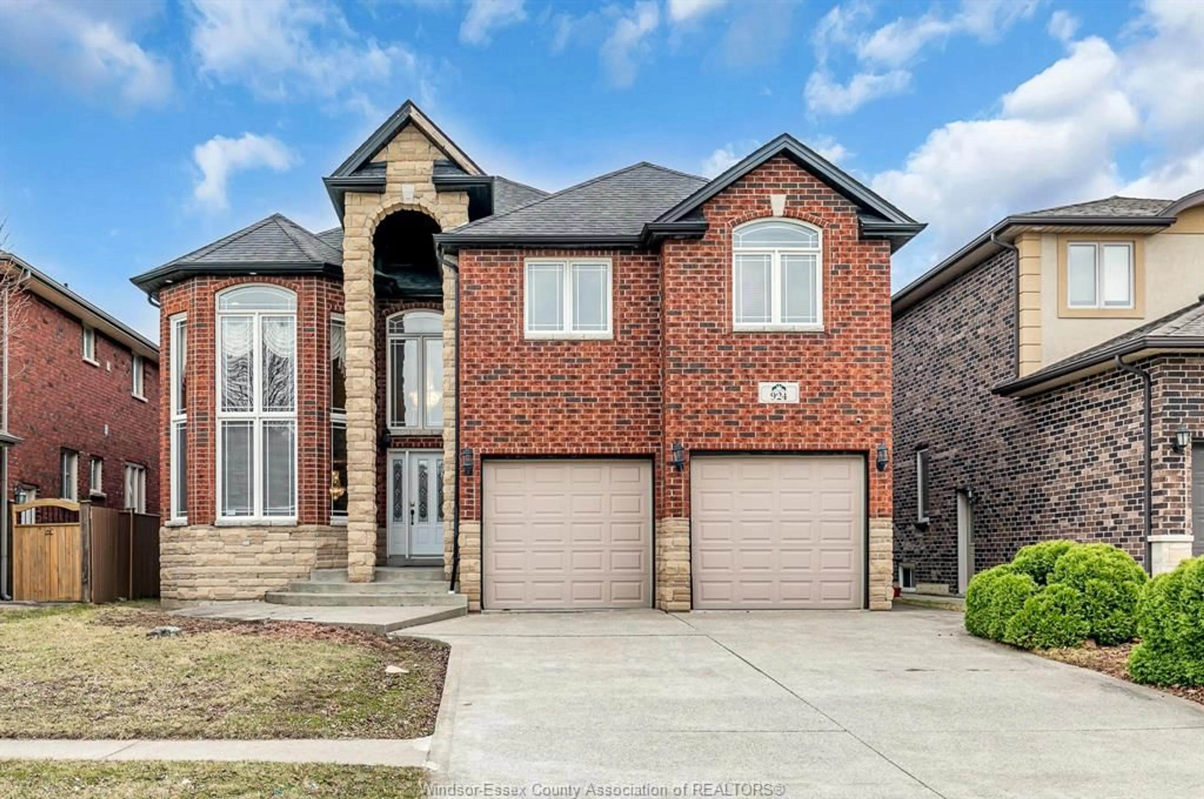Home with brick exterior material, street for 924 MASSIMO, Windsor Ontario N9G 3C6