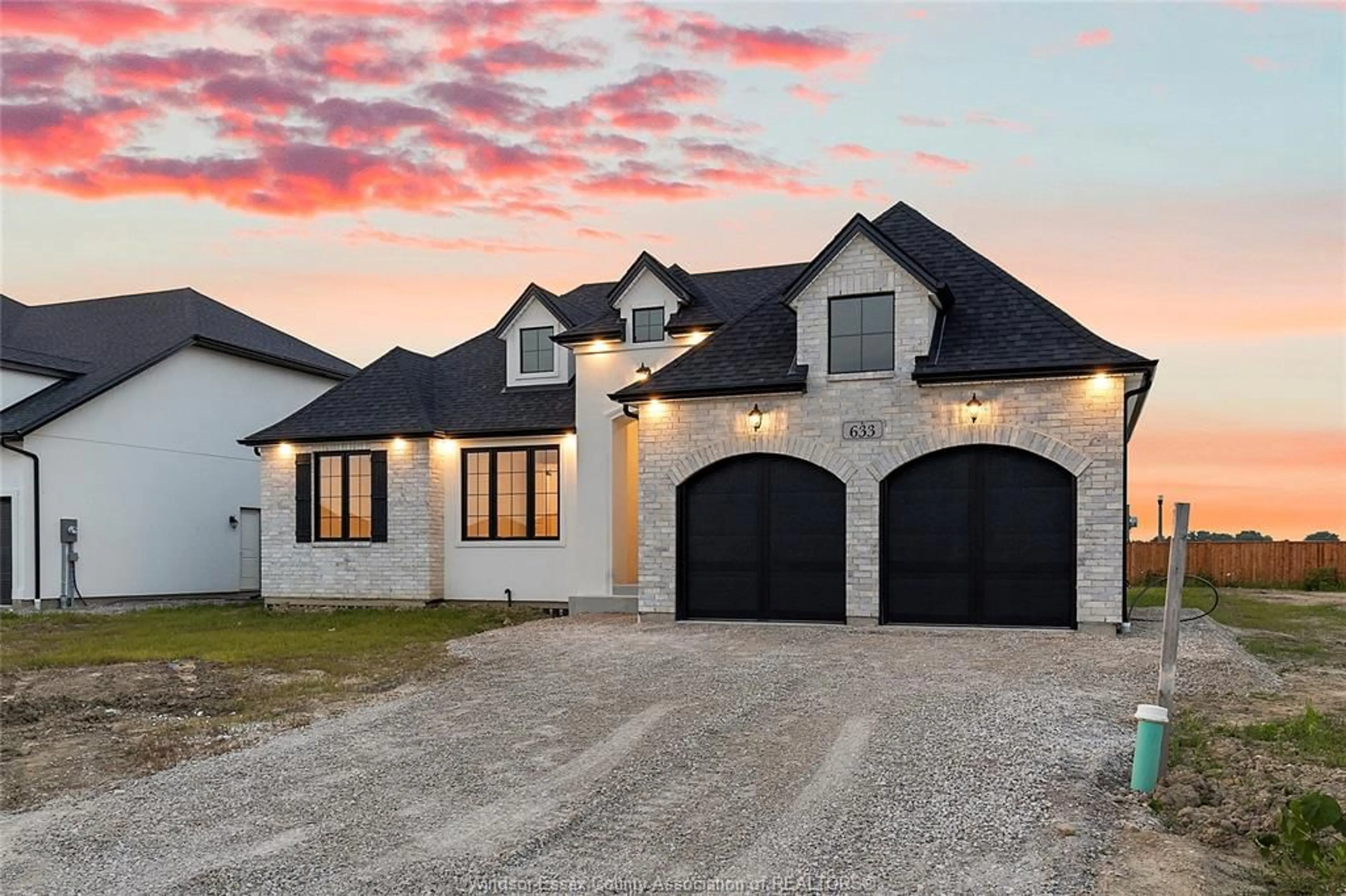 Home with brick exterior material, street for 633 Summit St, Lakeshore Ontario N0R 1A0