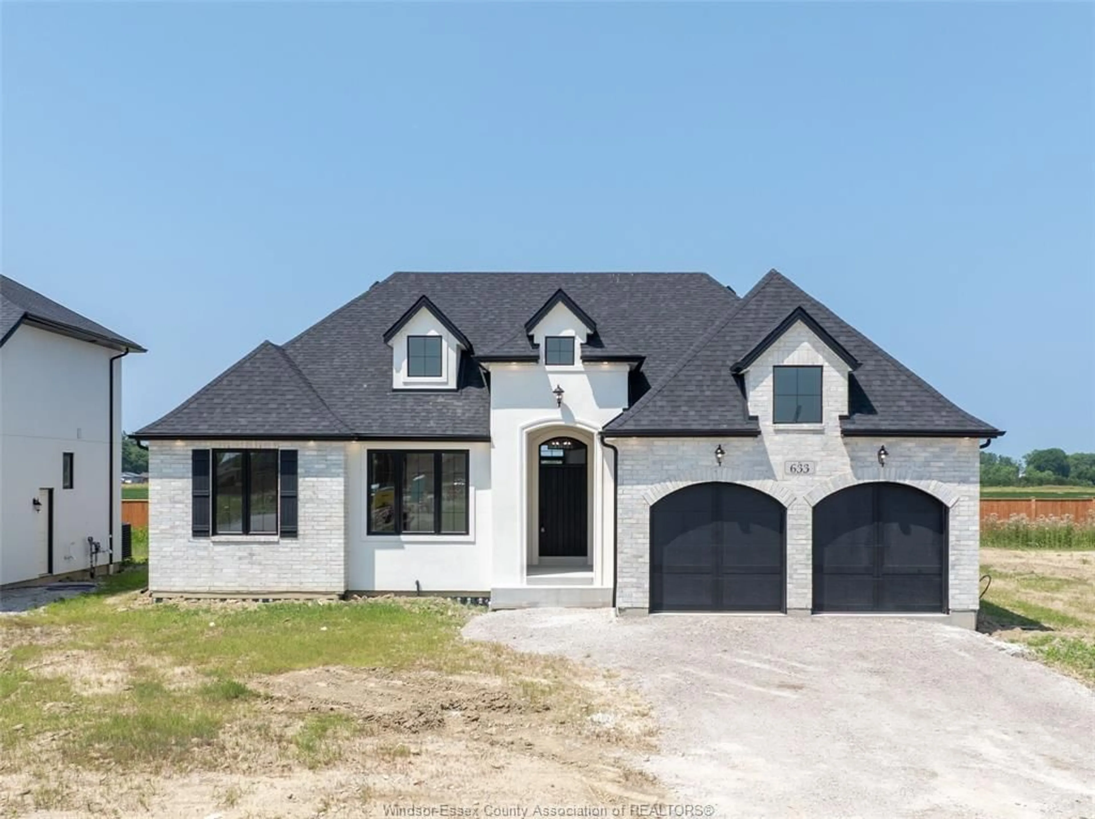 Home with brick exterior material, street for 633 Summit St, Lakeshore Ontario N0R 1A0