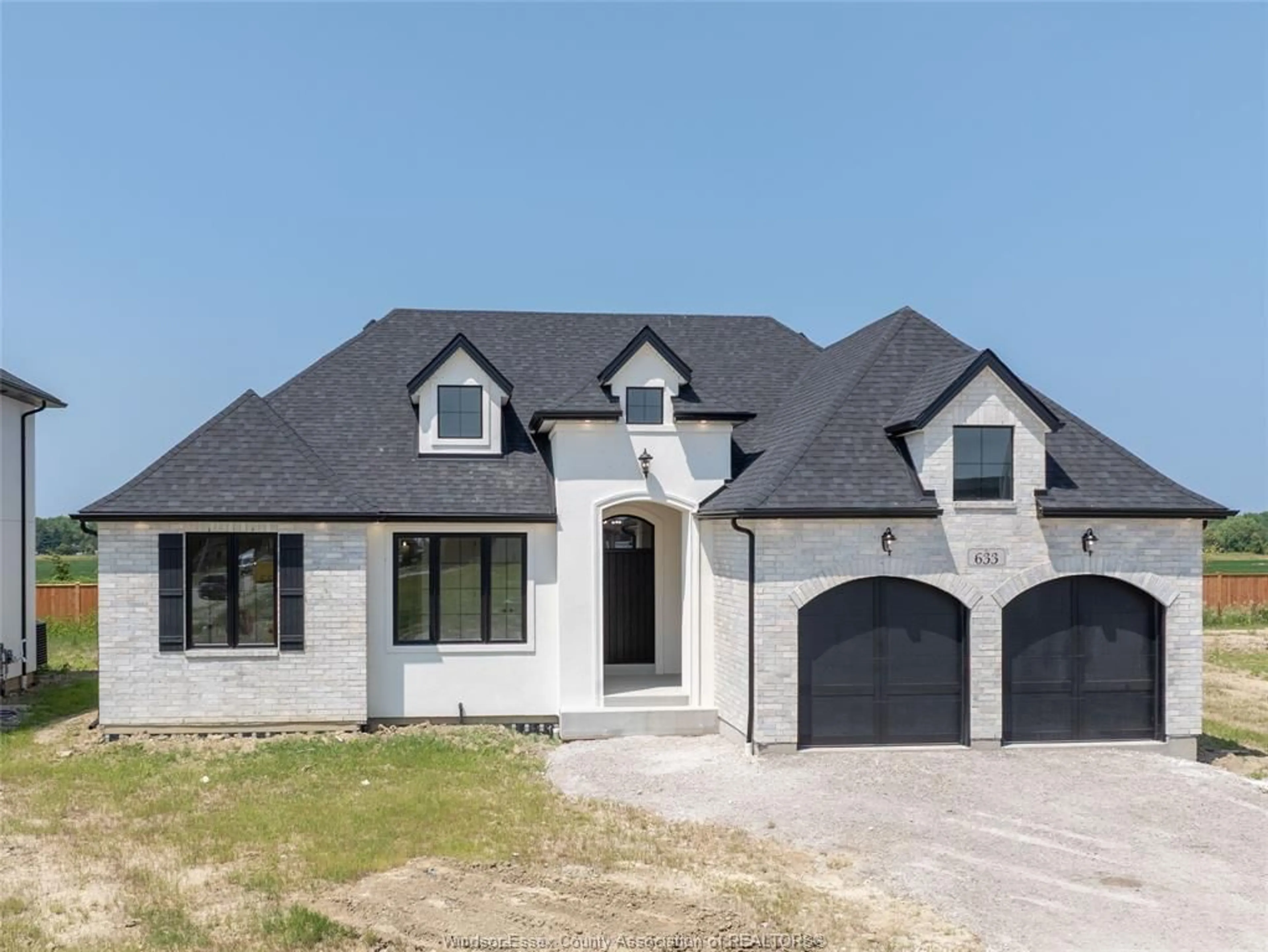 Home with brick exterior material, street for 633 Summit St, Lakeshore Ontario N0R 1A0