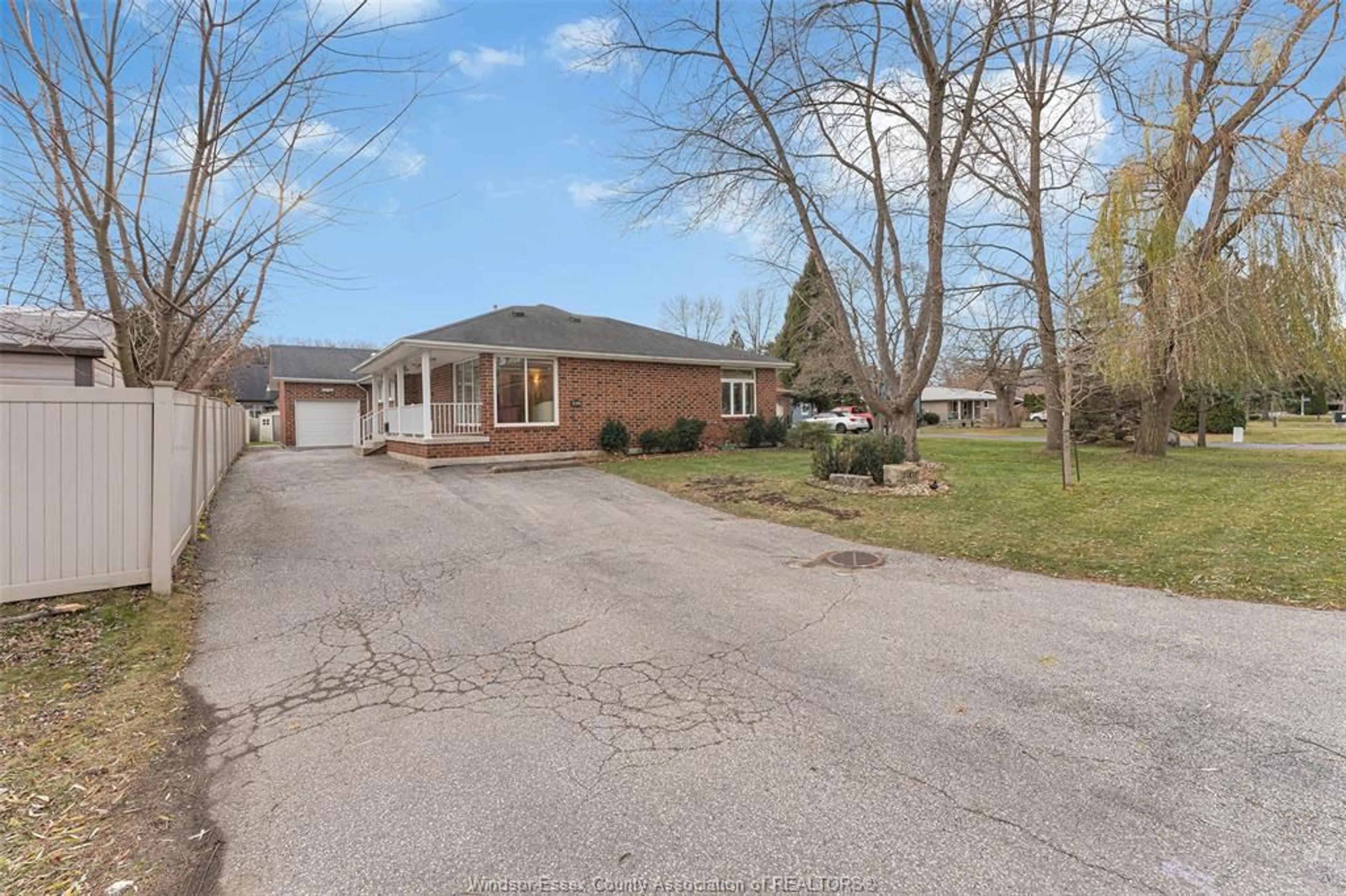 A pic from outside/outdoor area/front of a property/back of a property/a pic from drone, street for 1402 REAUME, LaSalle Ontario N9J 1C2