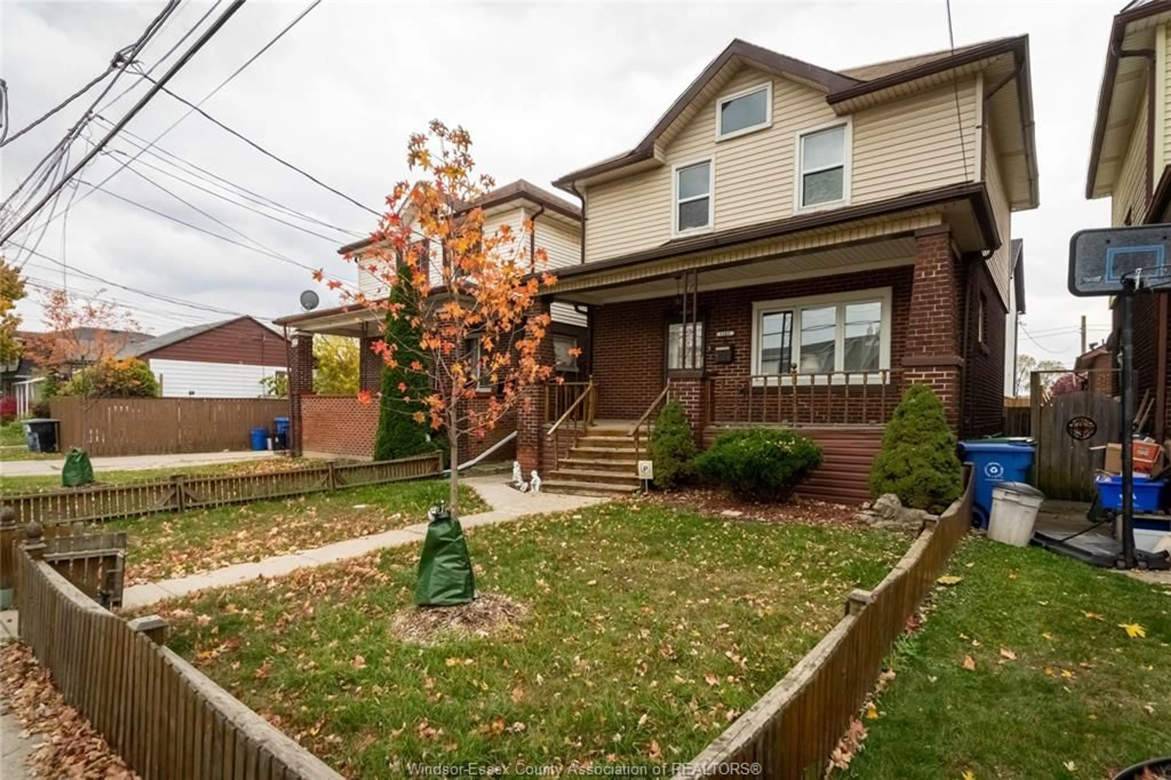 Home with brick exterior material, street for 1161 Elm, Windsor Ontario N9A 3J1