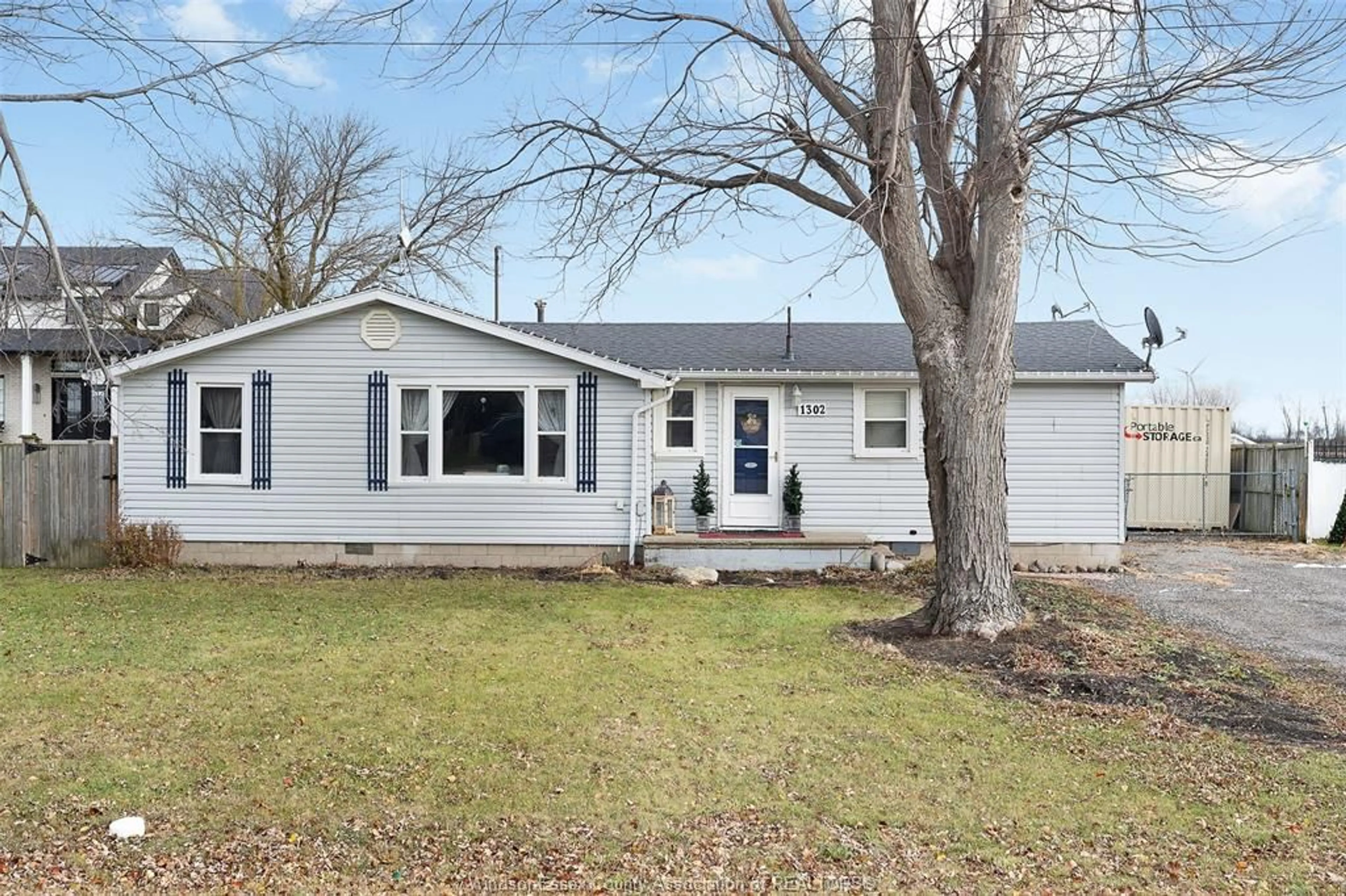 Home with vinyl exterior material, street for 1302 COUNTY RD 31, St. Joachim Ontario N0R 1S0