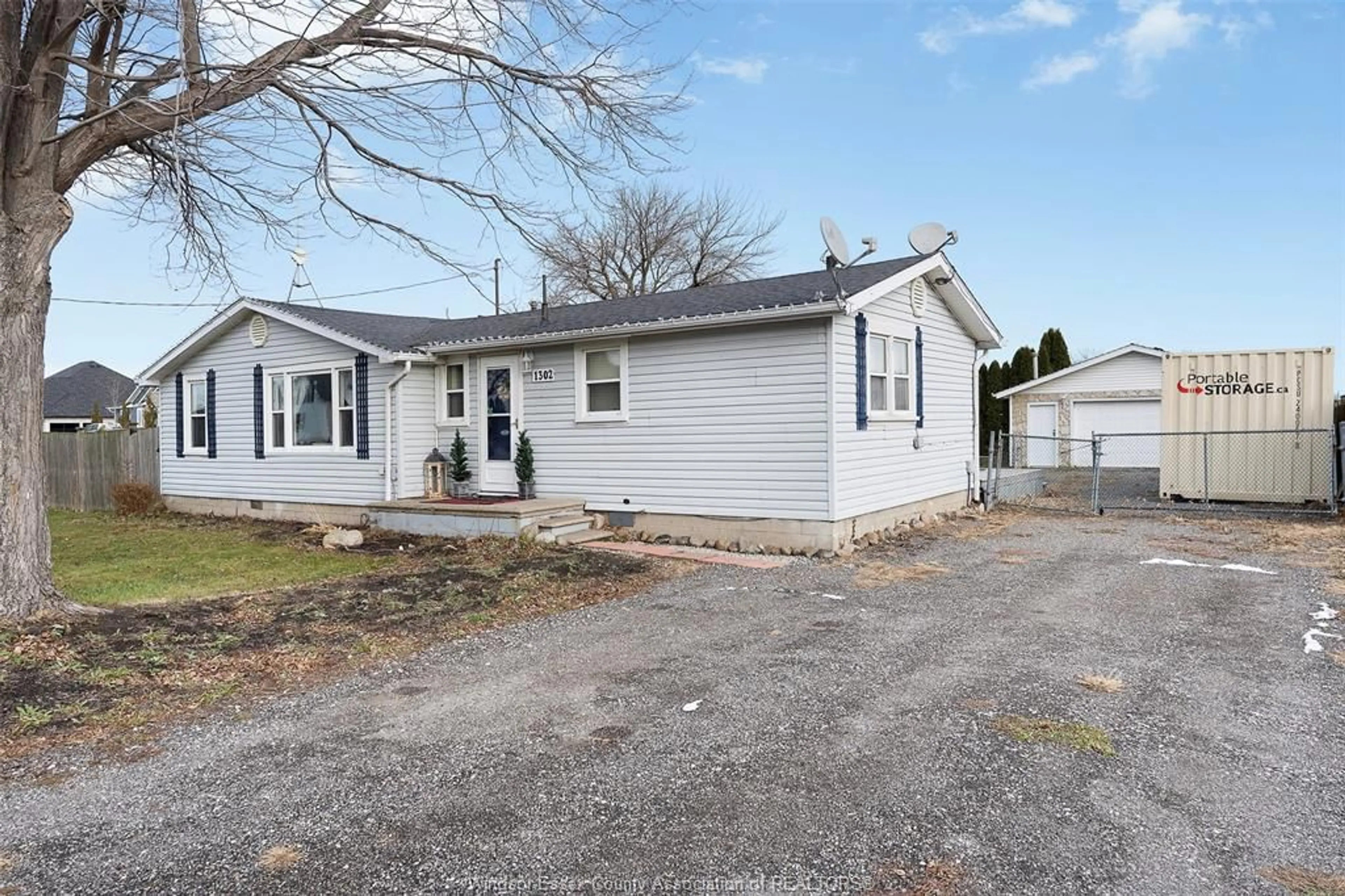 Home with vinyl exterior material, street for 1302 COUNTY RD 31, St. Joachim Ontario N0R 1S0