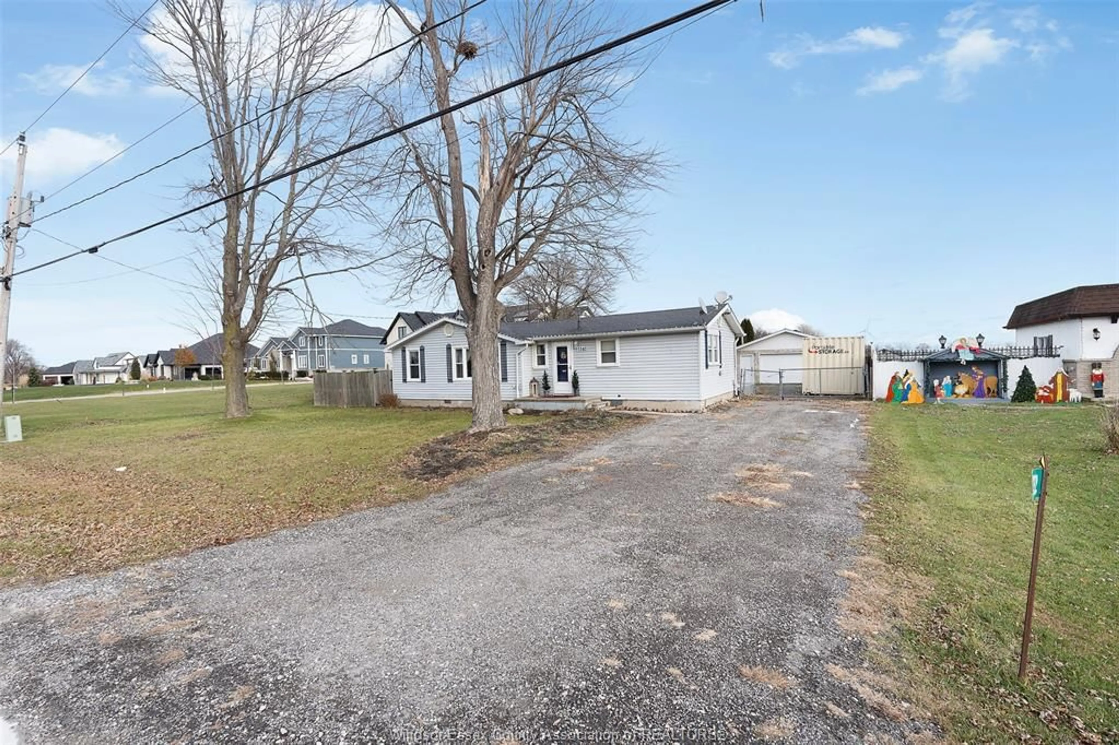 A pic from outside/outdoor area/front of a property/back of a property/a pic from drone, street for 1302 COUNTY RD 31, St. Joachim Ontario N0R 1S0