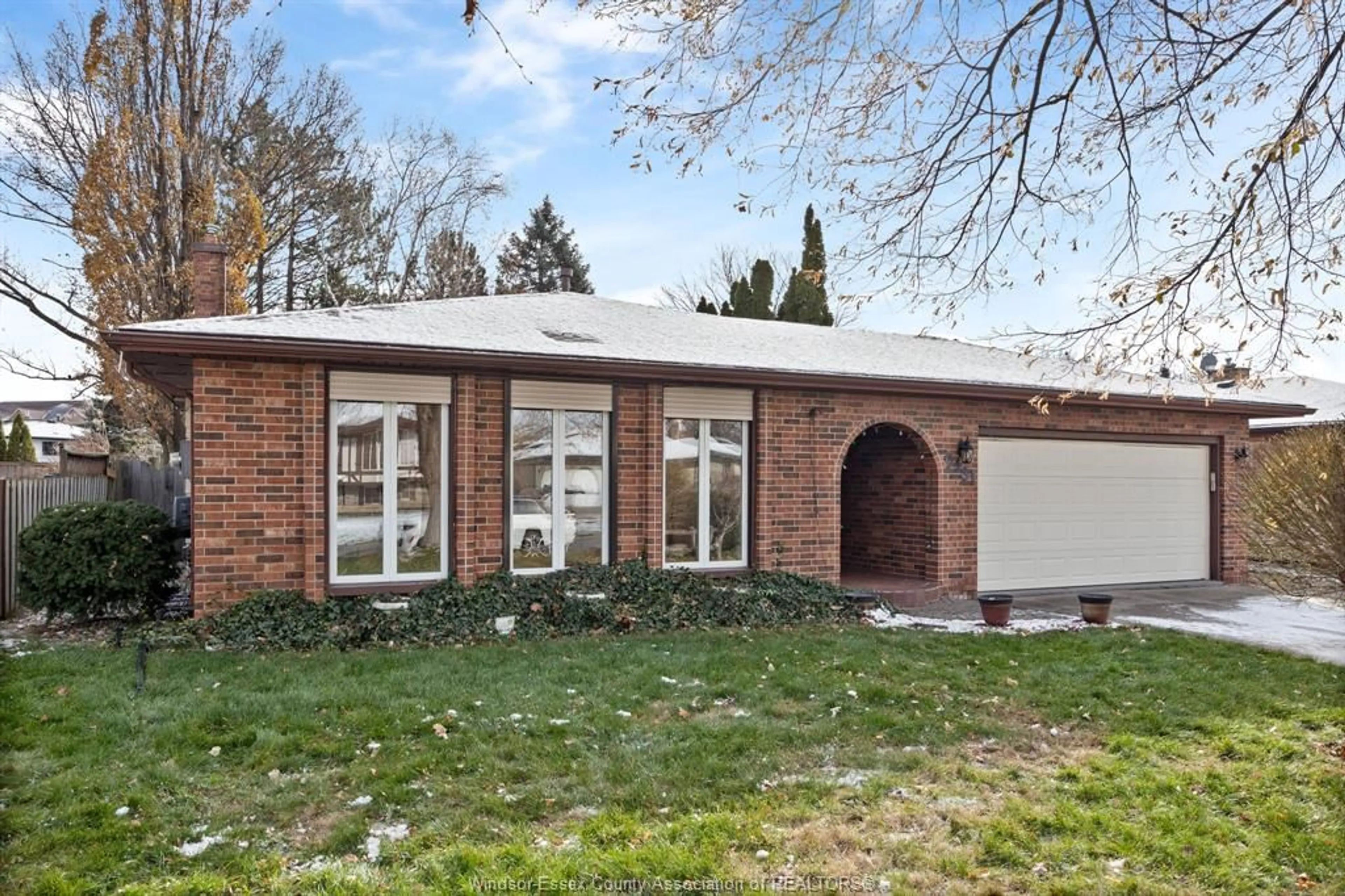 Home with brick exterior material, street for 9431 ASHLAND Dr, Windsor Ontario N8R 1V3