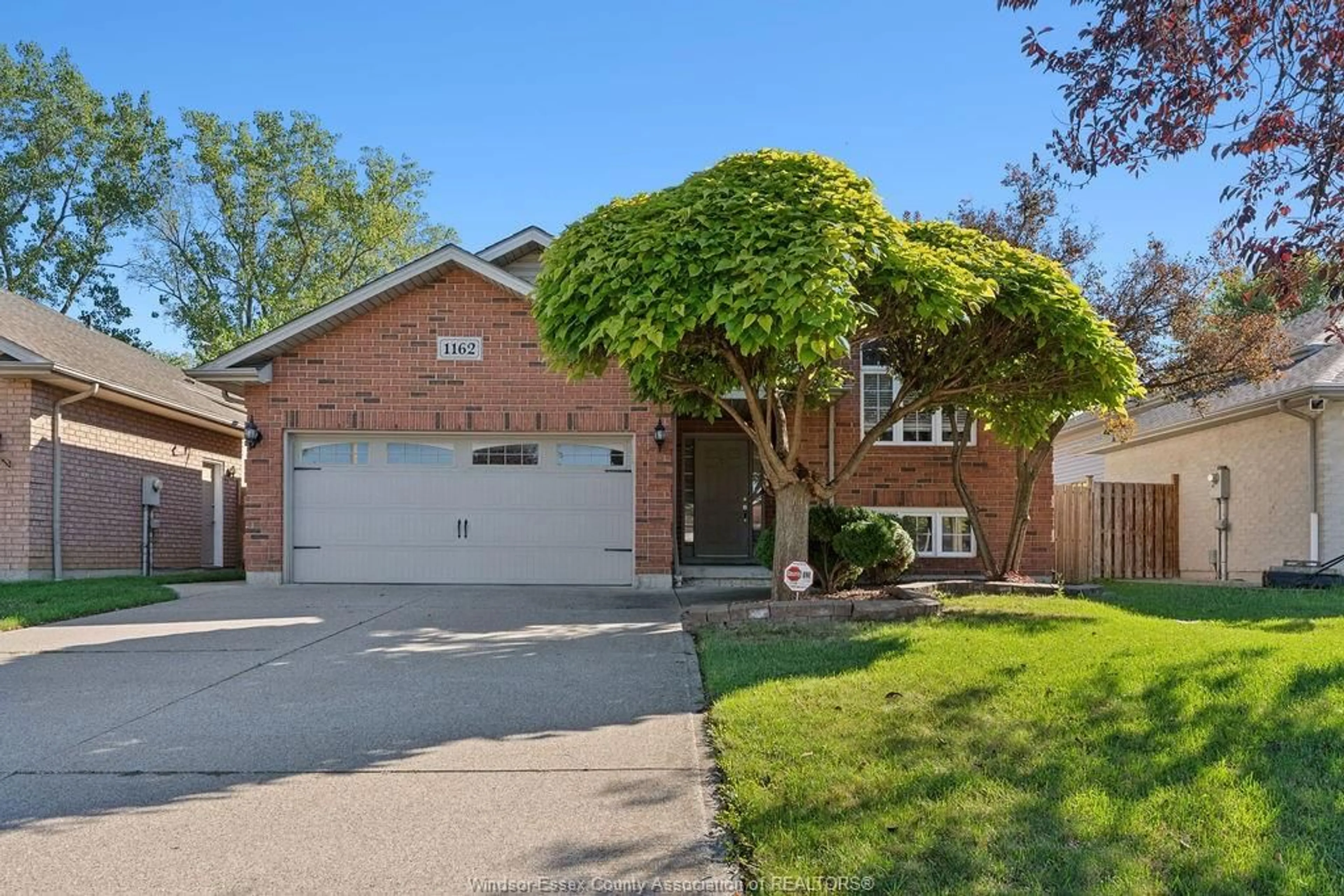 Home with brick exterior material, street for 1162 BANWELL Rd, Windsor Ontario N8P 1J2