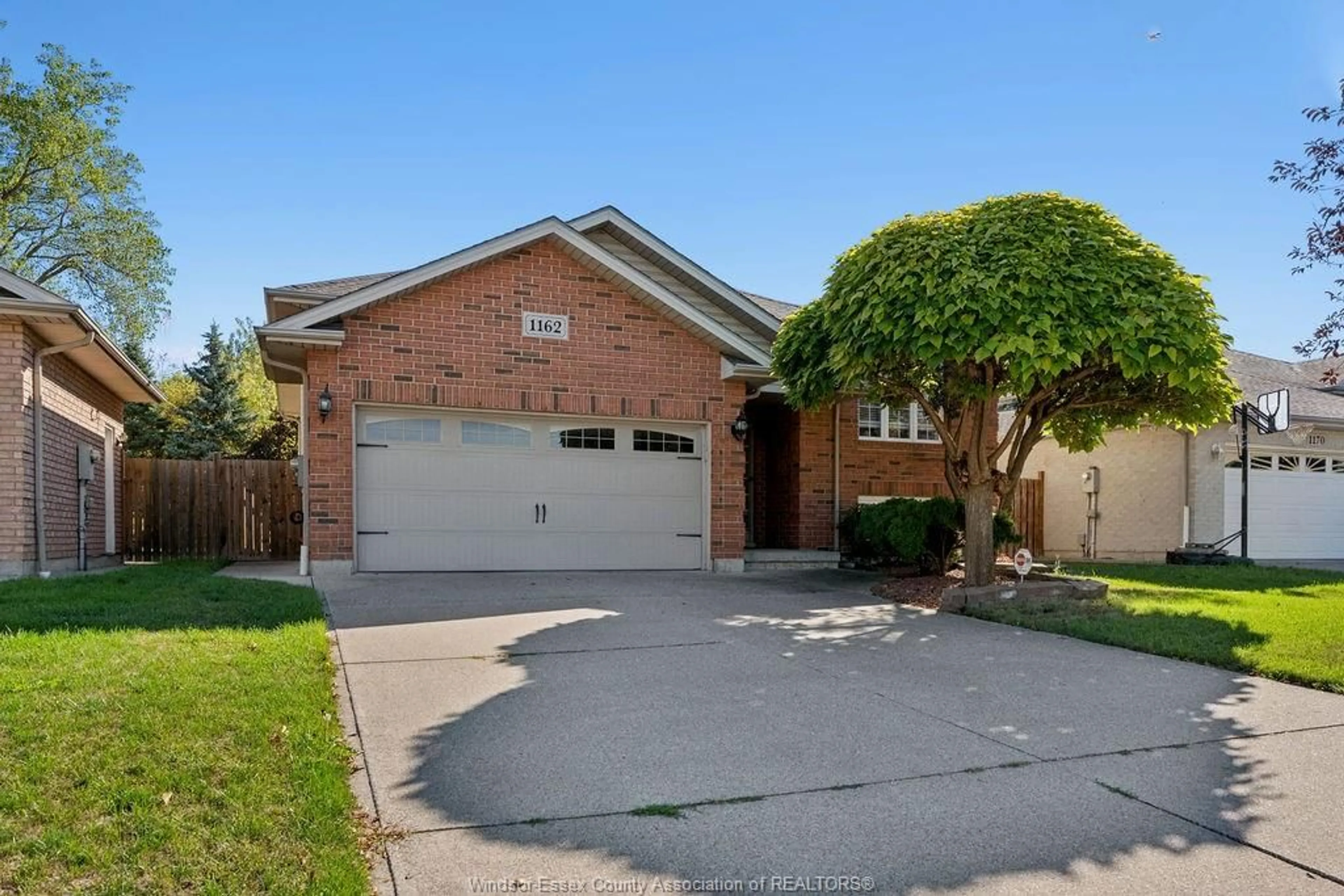 Home with brick exterior material, street for 1162 BANWELL Rd, Windsor Ontario N8P 1J2