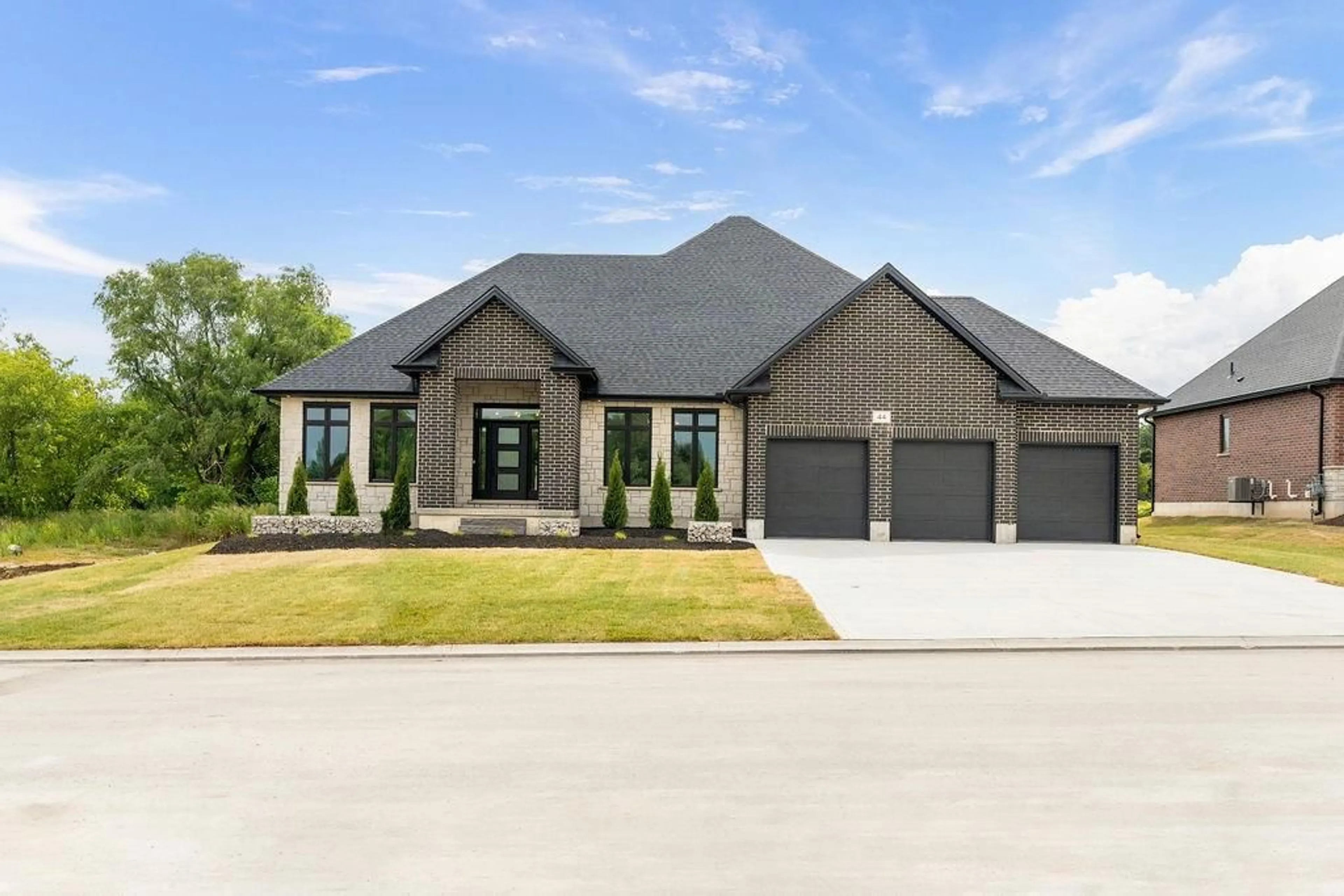 Home with brick exterior material, street for 52 EAST GLEN Dr, Lambton Shores Ontario N0M 1B0