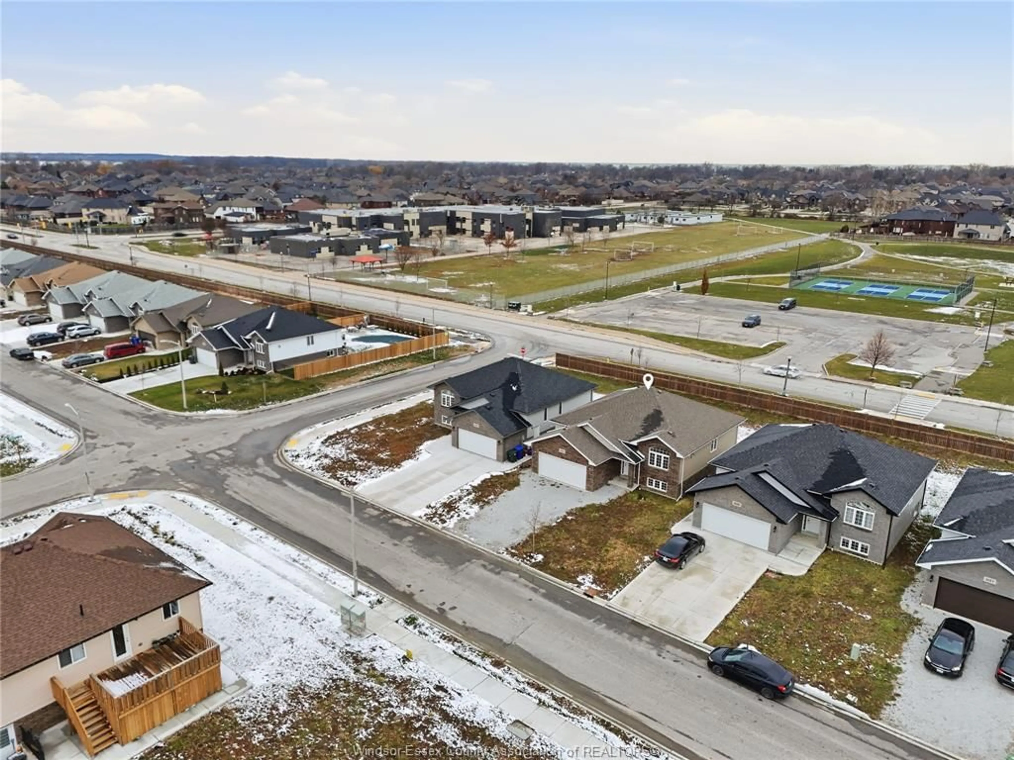 A pic from outside/outdoor area/front of a property/back of a property/a pic from drone, street for 1131 ASPEN RIDGE, Lakeshore Ontario N0R 1A0