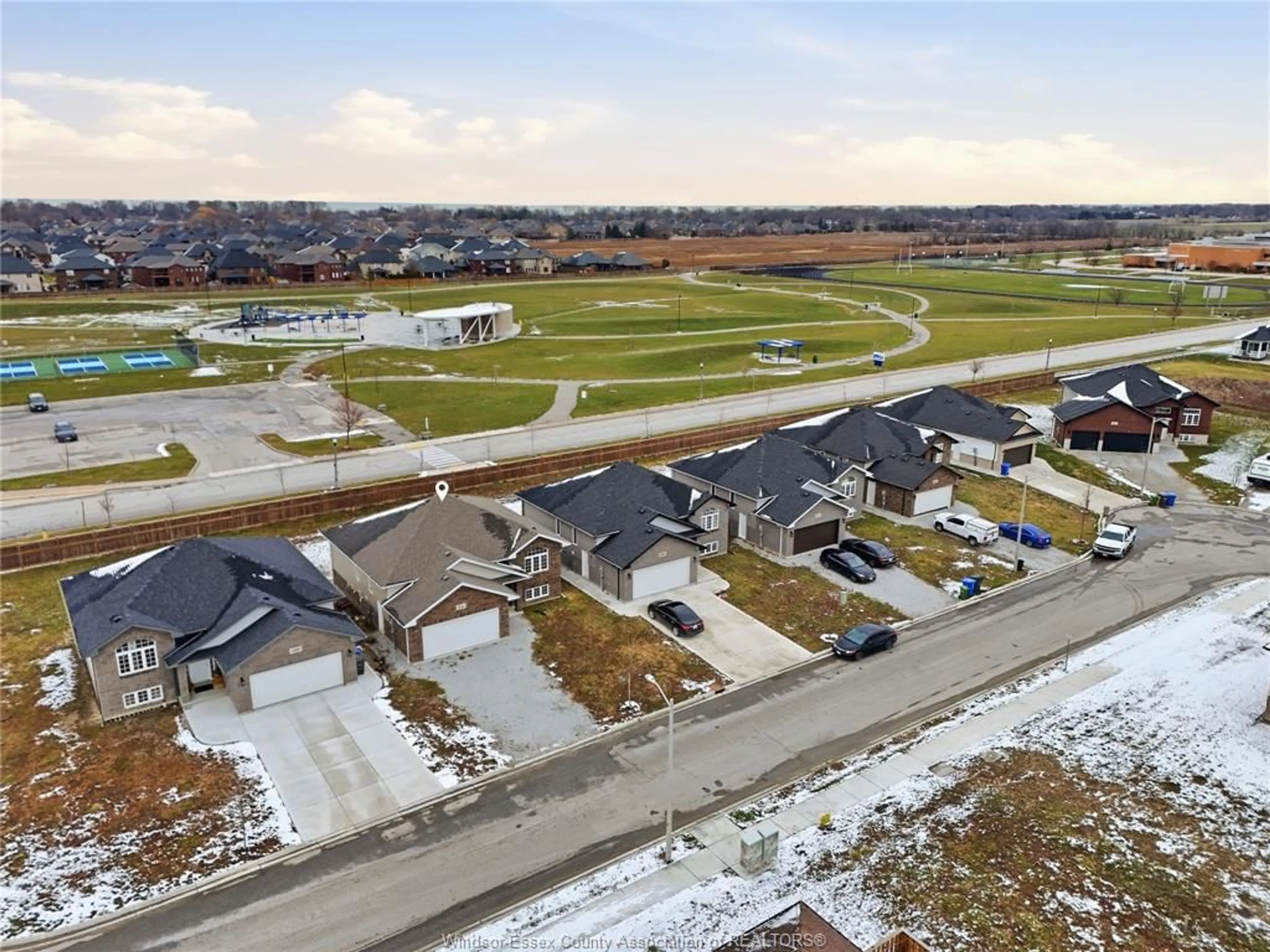 A pic from outside/outdoor area/front of a property/back of a property/a pic from drone, street for 1131 ASPEN RIDGE, Lakeshore Ontario N0R 1A0