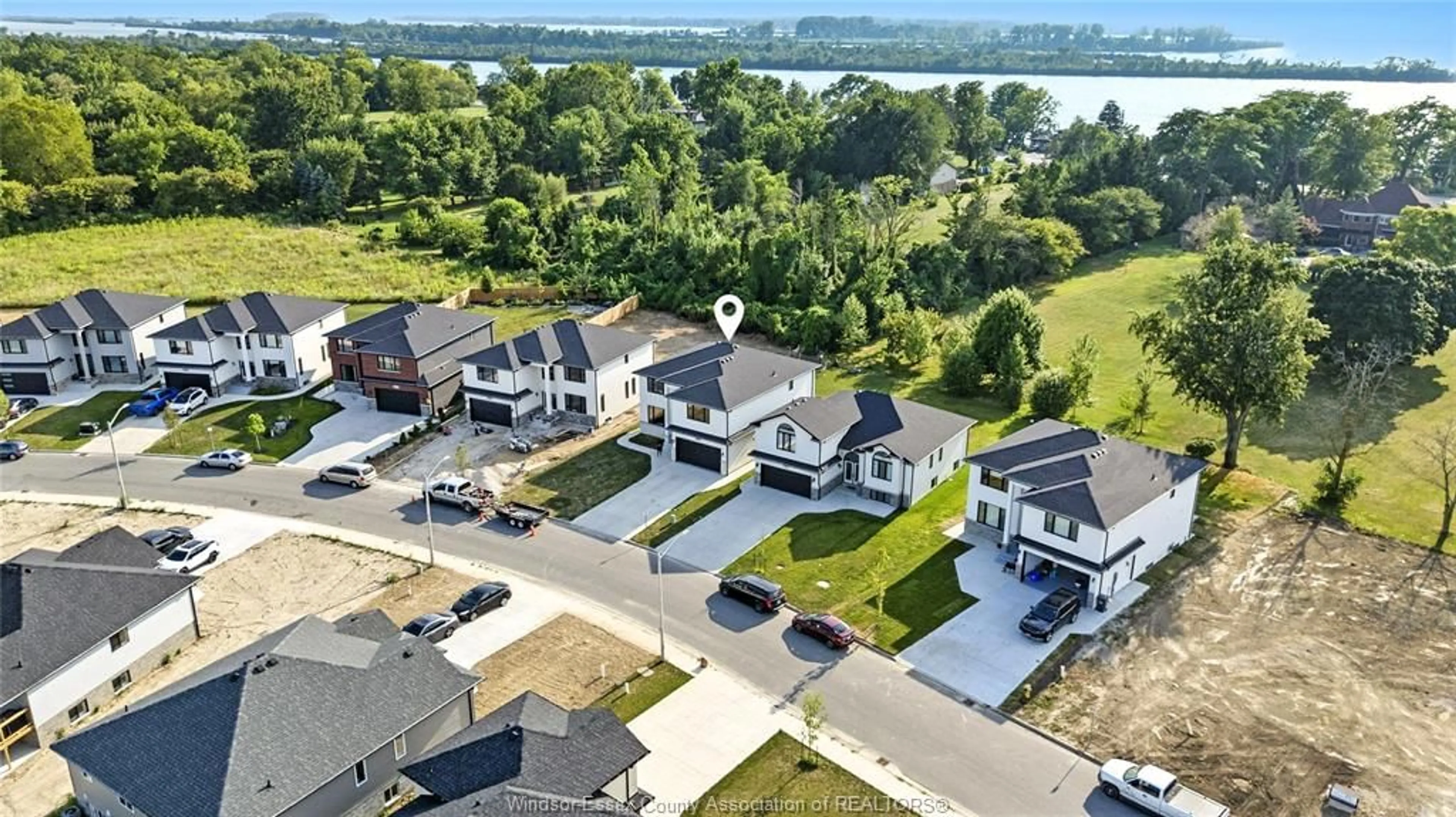 A pic from outside/outdoor area/front of a property/back of a property/a pic from drone, water/lake/river/ocean view for 27 KINGSBRIDGE Dr, Amherstburg Ontario N9V 4A4