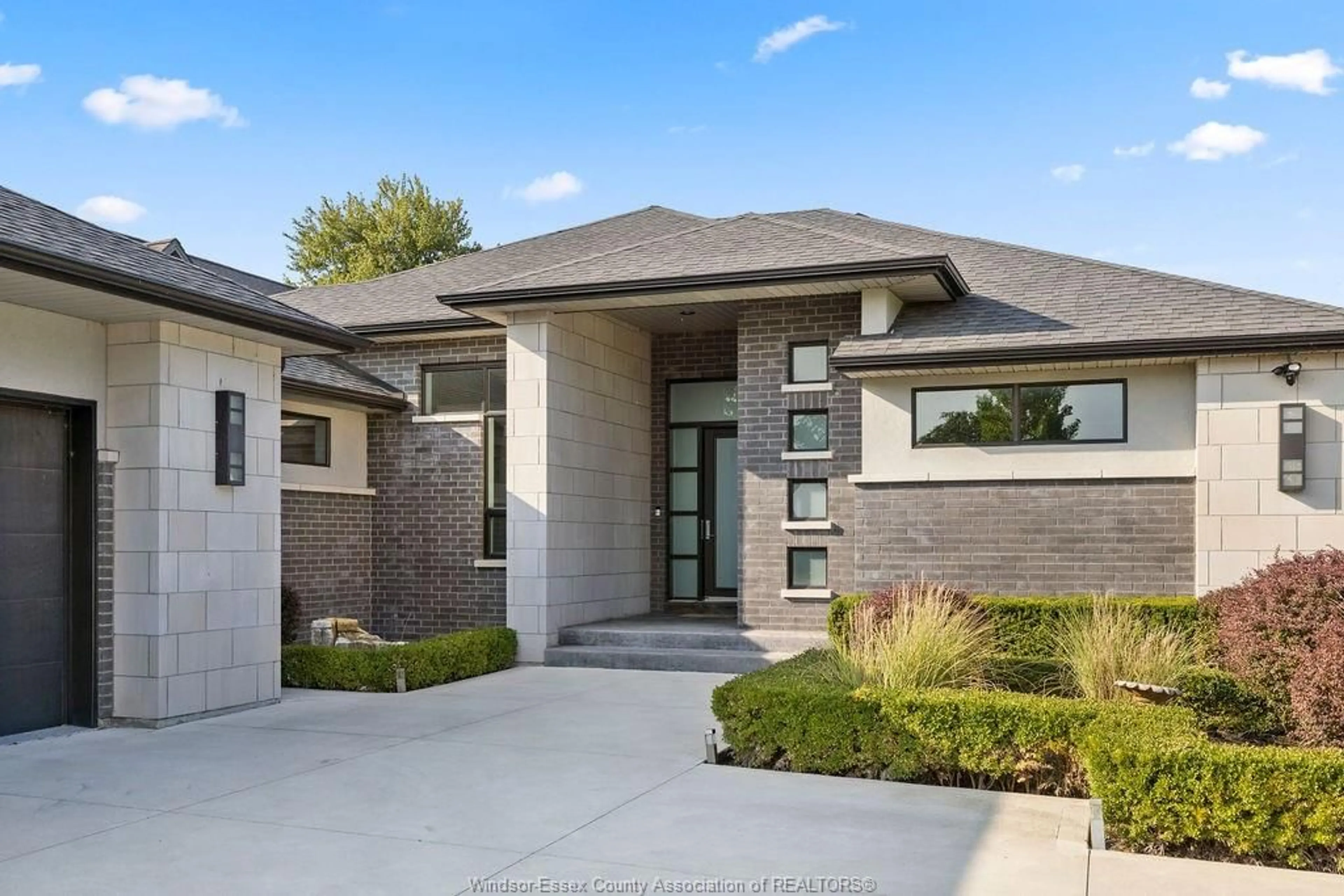 Home with brick exterior material, street for 371 CHARRON BEACH, Lakeshore Ontario N8L 0G2