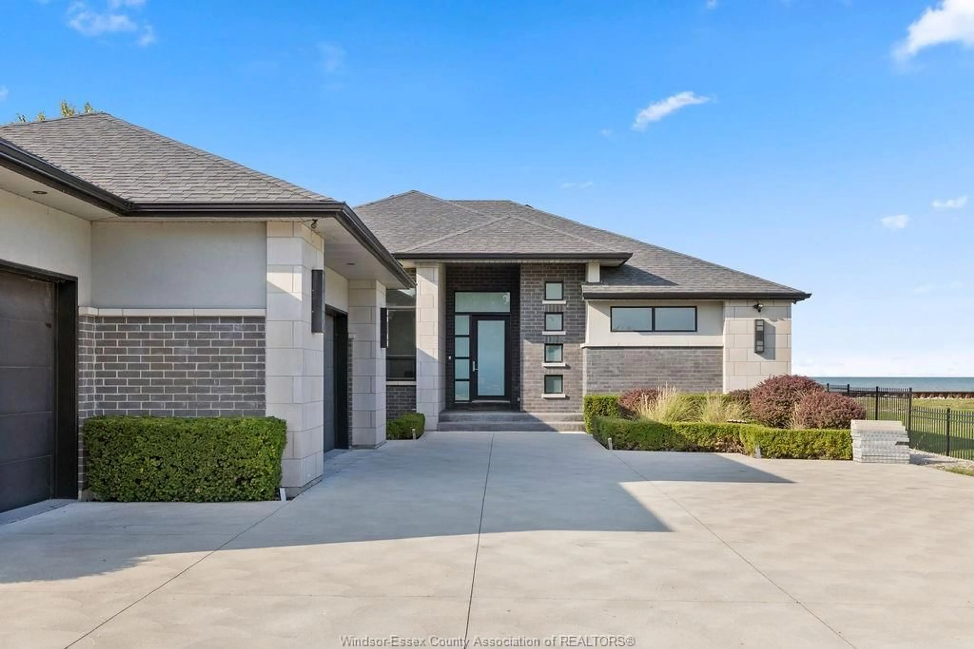 Home with brick exterior material, street for 371 CHARRON BEACH, Lakeshore Ontario N8L 0G2