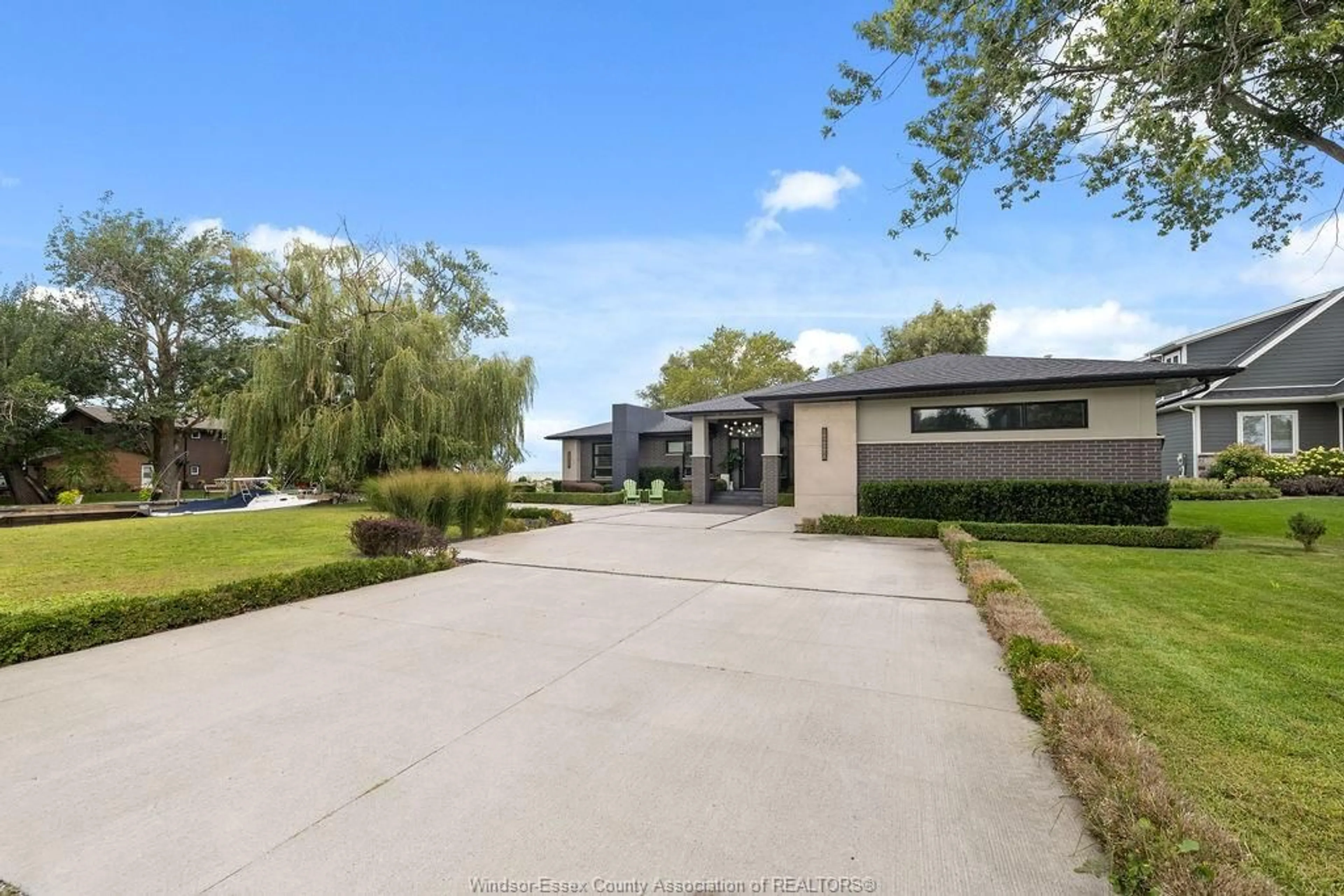 A pic from outside/outdoor area/front of a property/back of a property/a pic from drone, street for 551 ROSS BEACH Rd, Lakeshore Ontario N0R 1A0