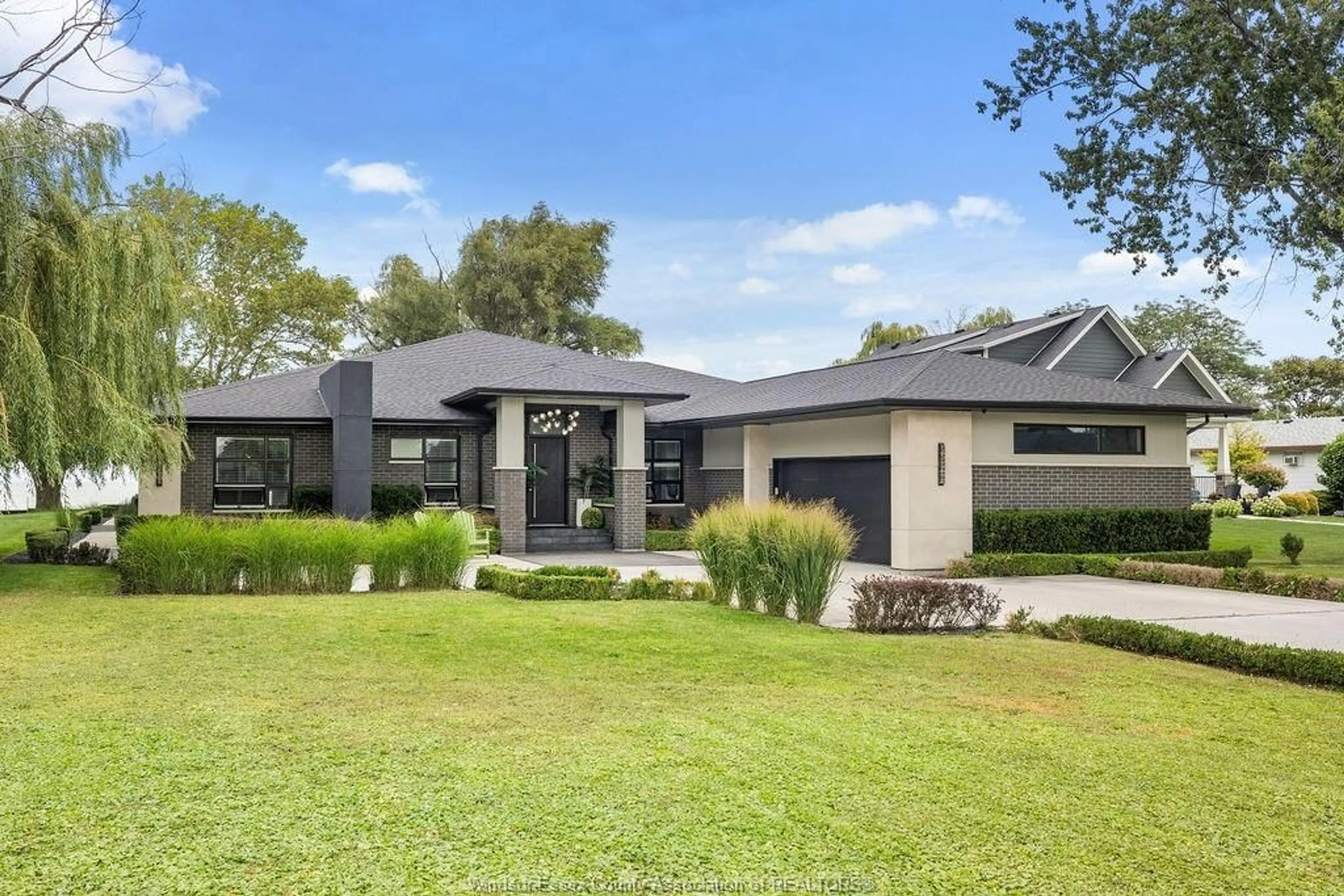 Home with brick exterior material, street for 551 ROSS BEACH Rd, Lakeshore Ontario N0R 1A0