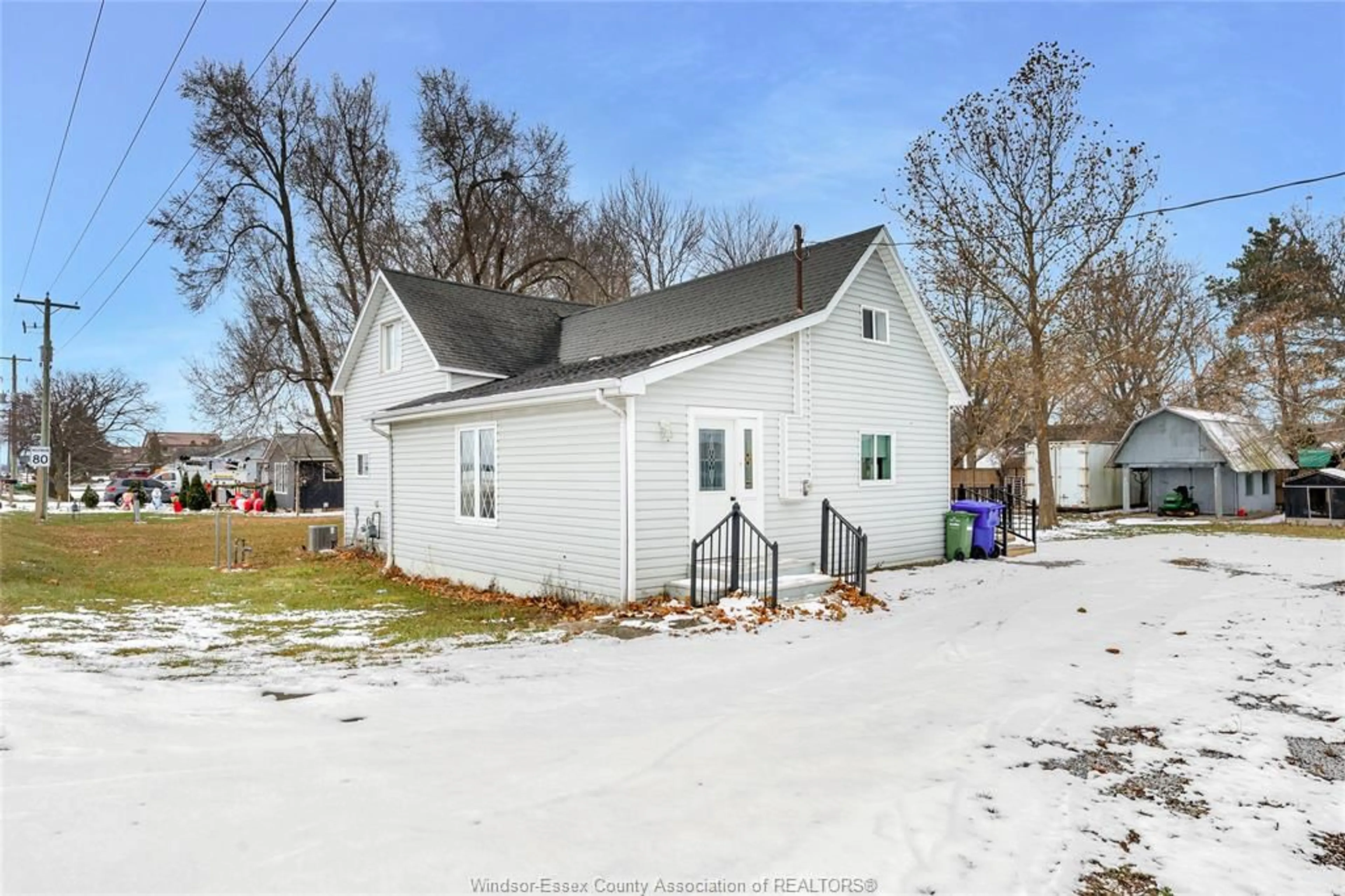 A pic from outside/outdoor area/front of a property/back of a property/a pic from drone, street for 6125 Essex Kent Rd, Tilbury North Ontario N0P 2L0