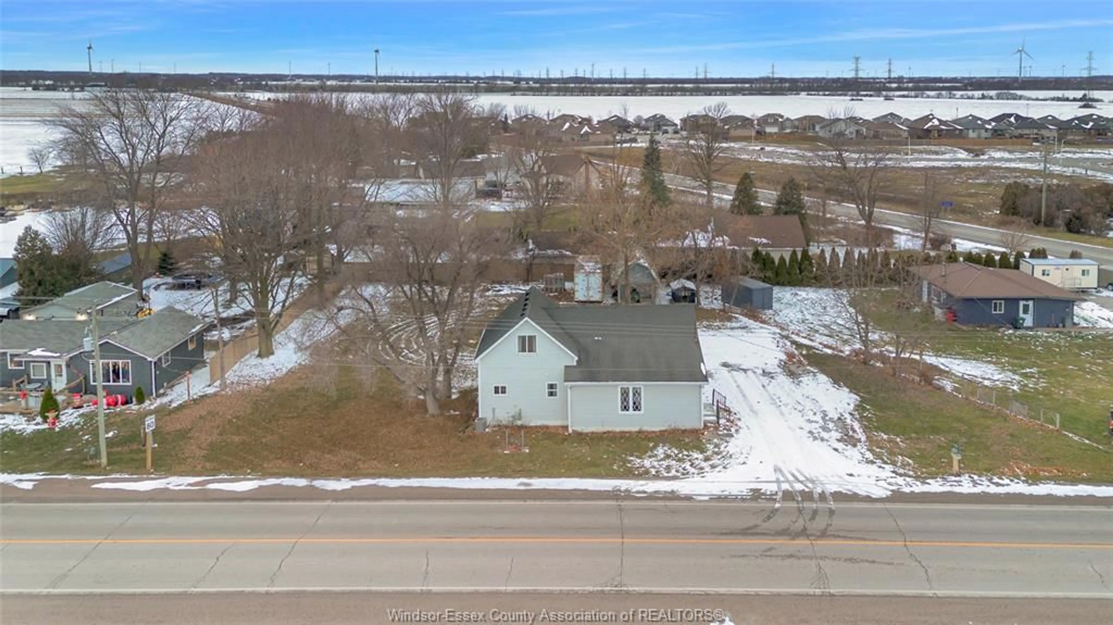 A pic from outside/outdoor area/front of a property/back of a property/a pic from drone, street for 6125 Essex Kent Rd, Tilbury North Ontario N0P 2L0